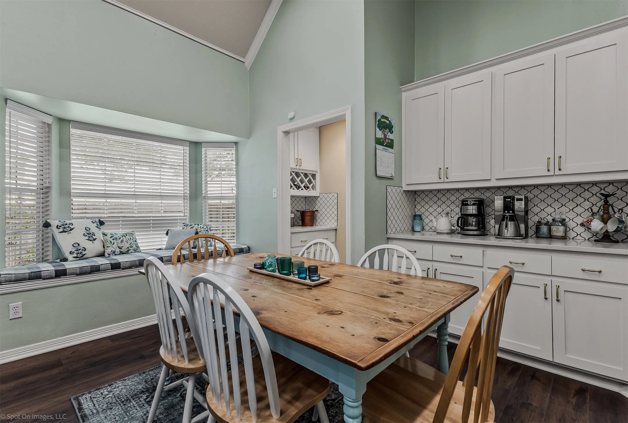 Great coffee bar with additional storage and note the butlers pantry between kitchen and dining room
