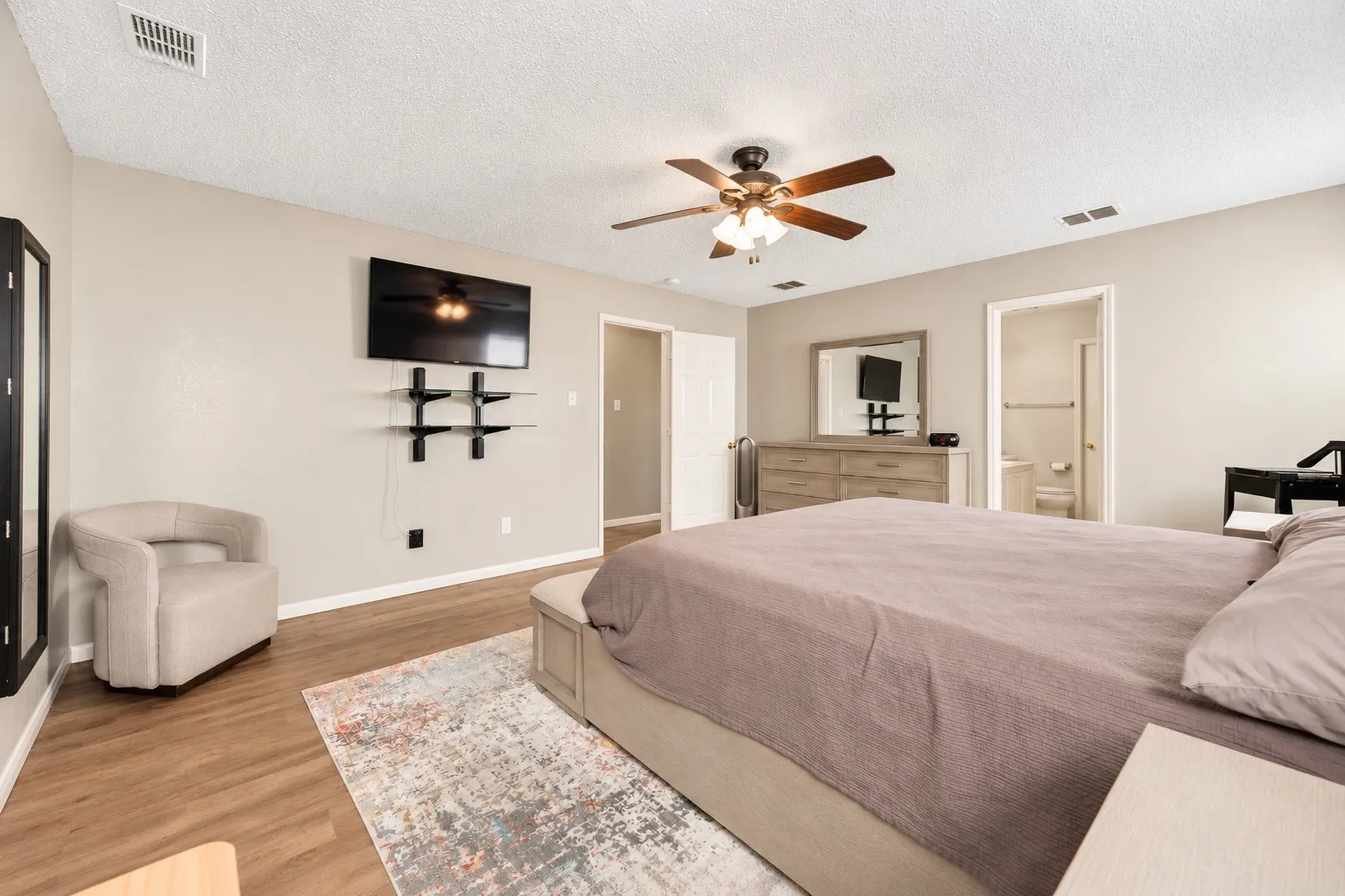 Wood-finish flooring throughout