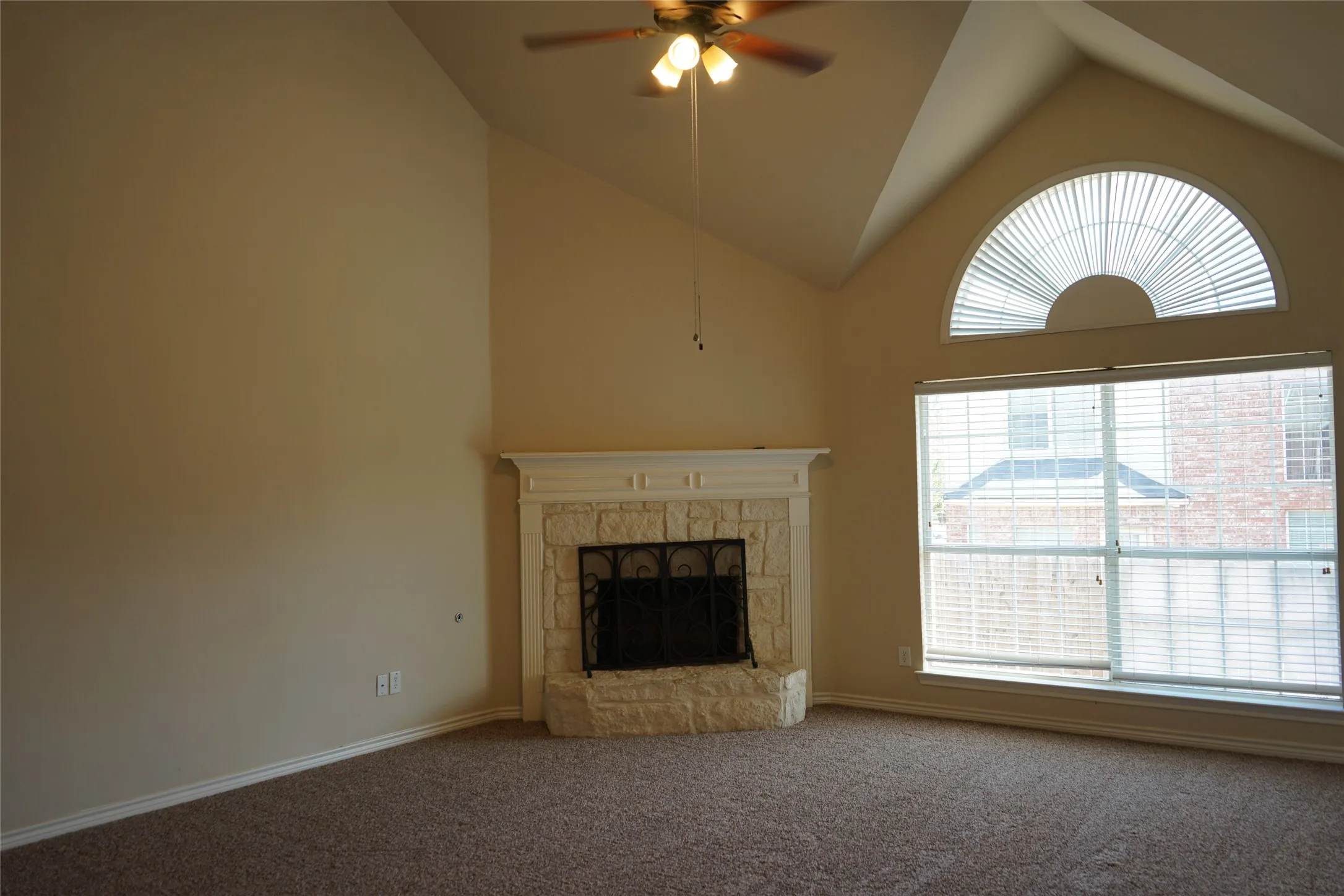 Beautiful Den off of the kitchen with fireplace and high ceilings