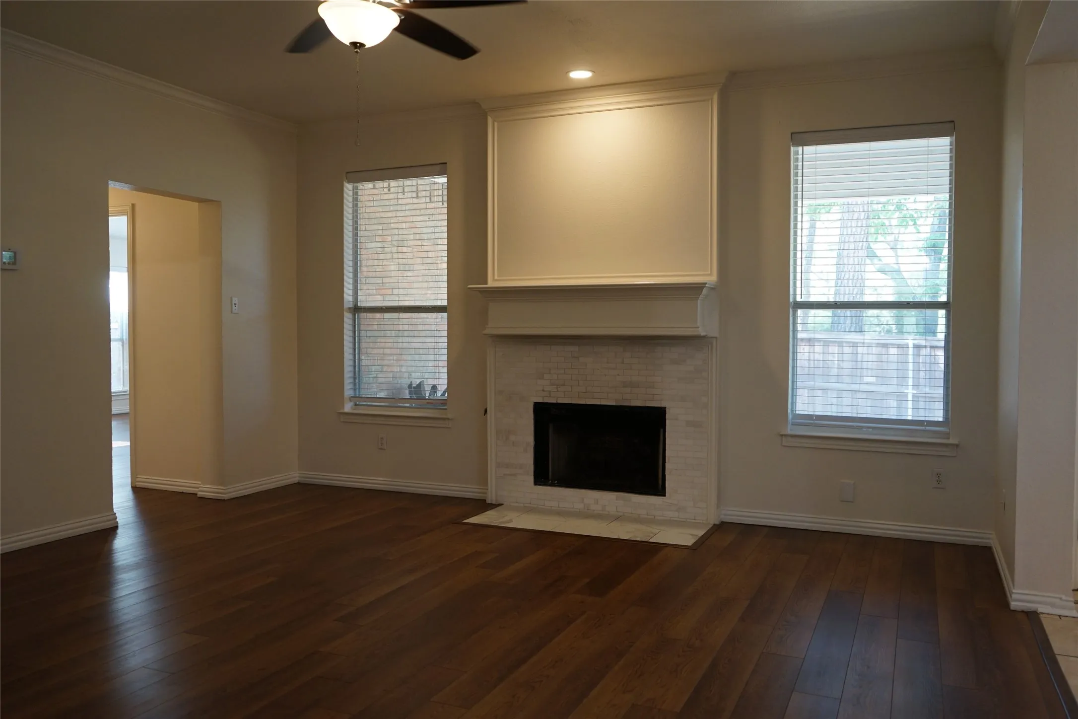 Cozy Den with Fireplace off of the Kitchen