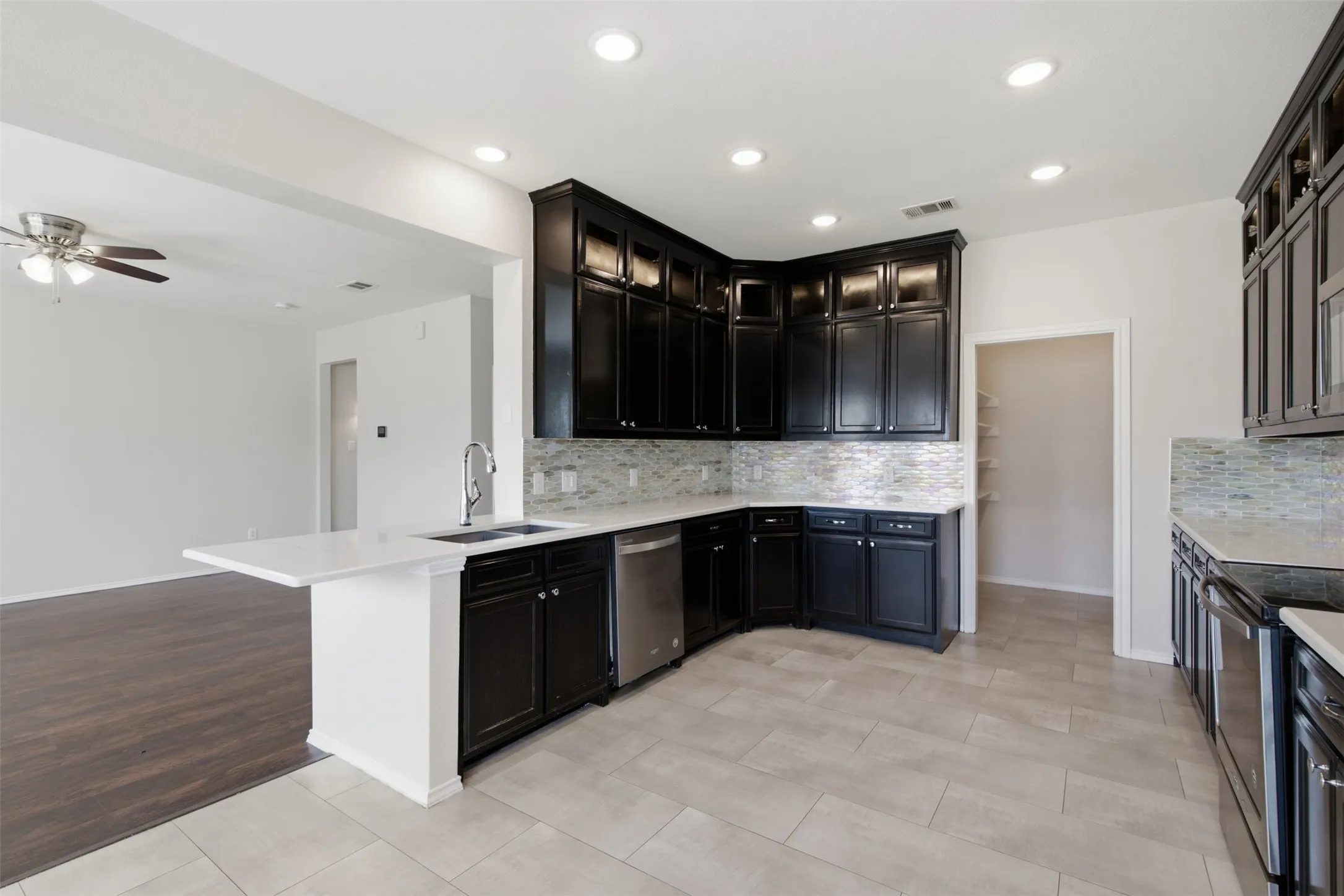 The Upper Cabinets have Lights to Display Nice Dishes!