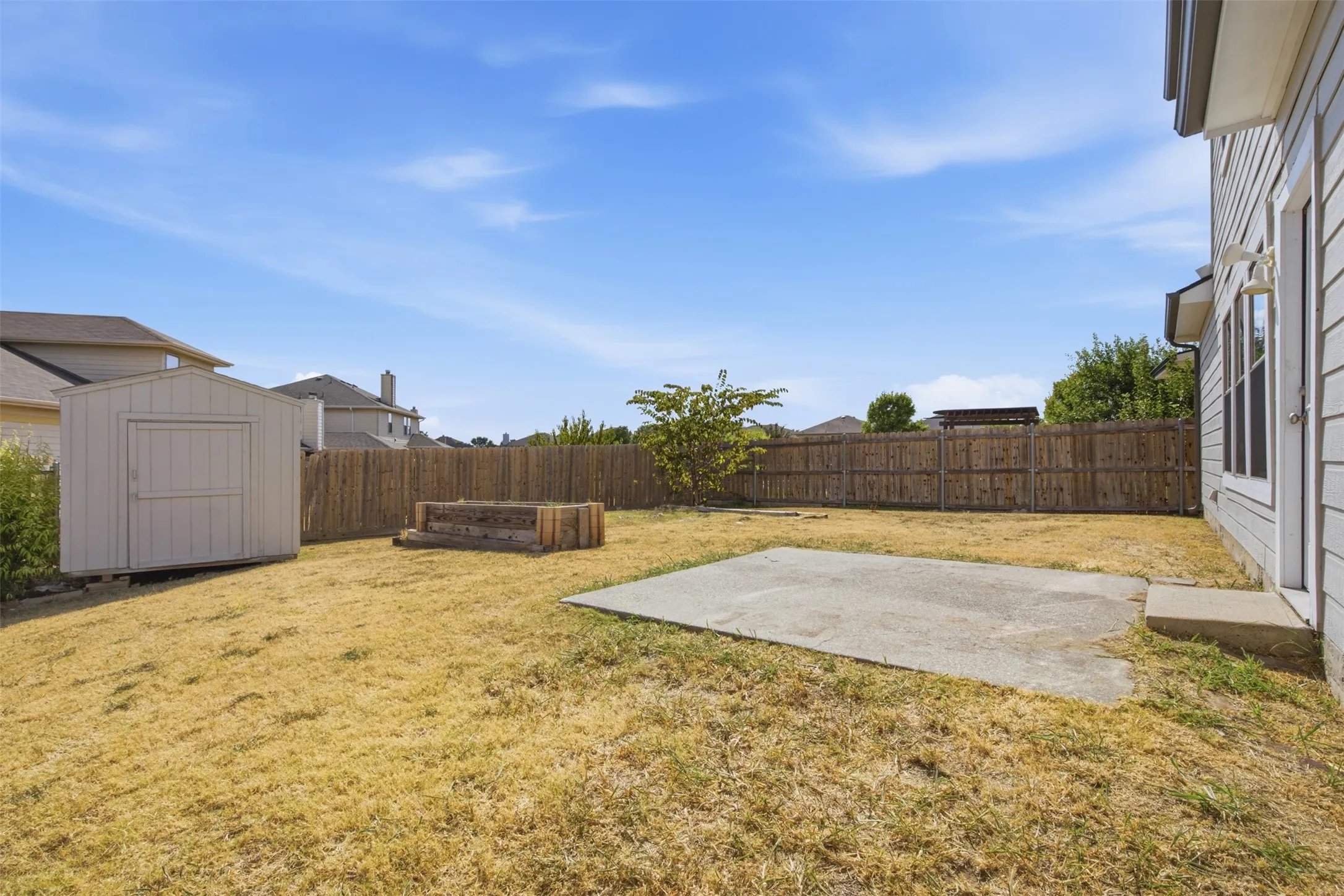 Nice Size Backyard with a Patio!