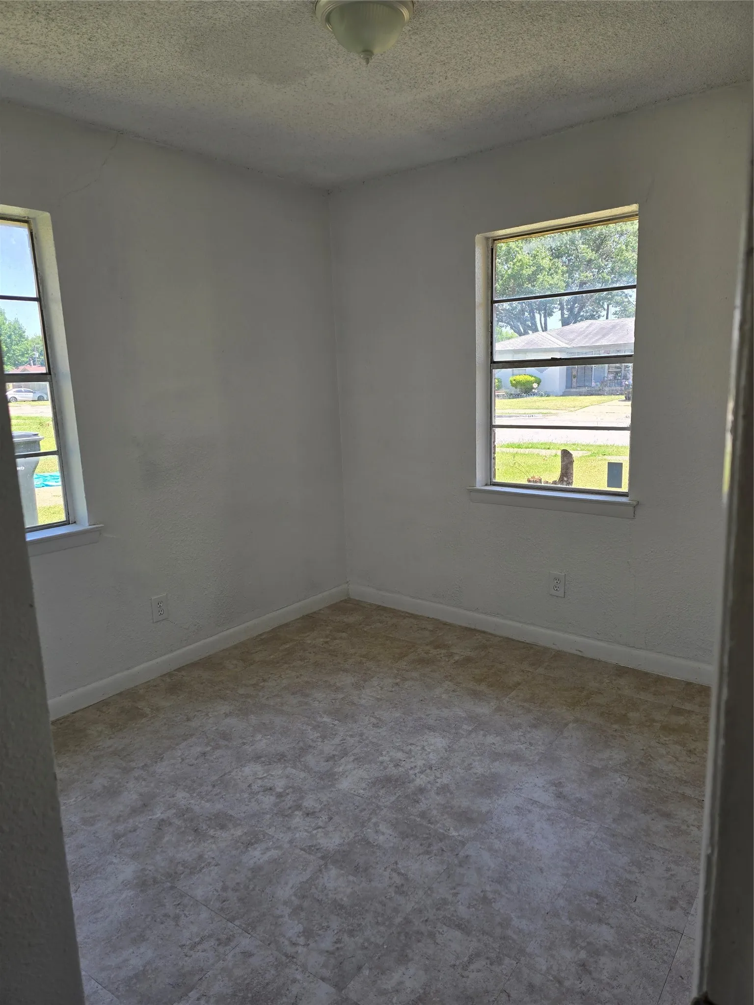 White wall finishes and neutral-toned flooring