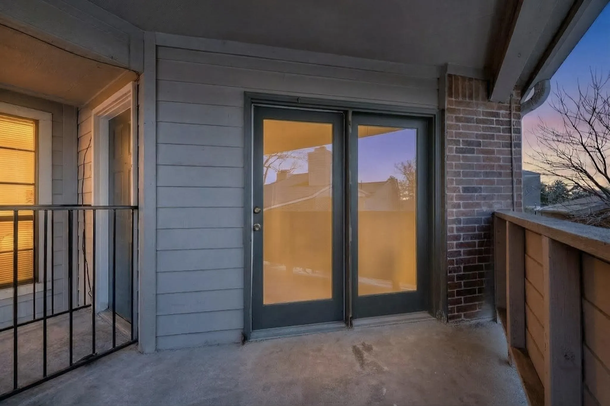 Property entrance with brick siding