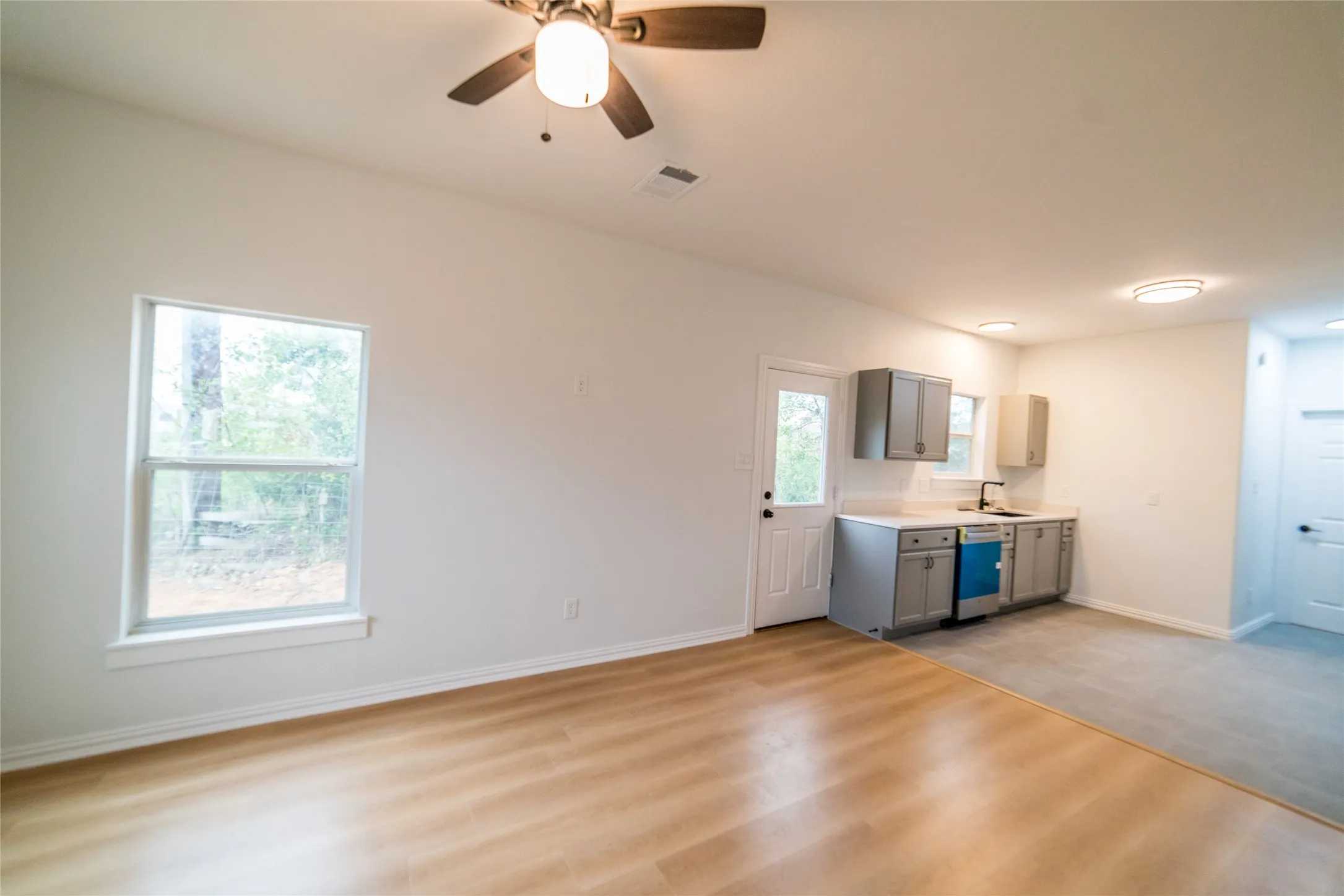 Living room with view of kitchen