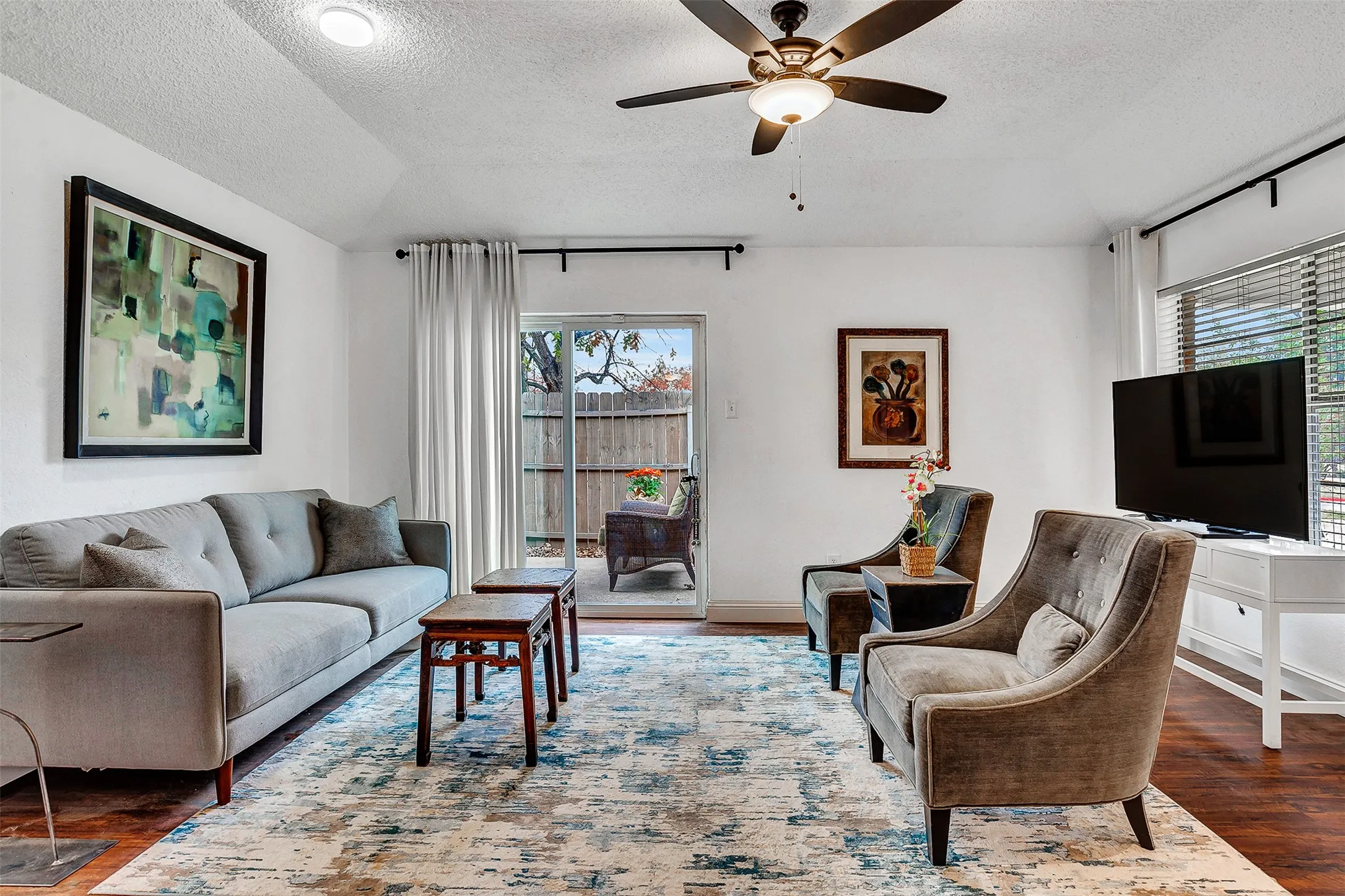 Hardwood flooring, recessed lighting, and a ceiling fan with light fixture