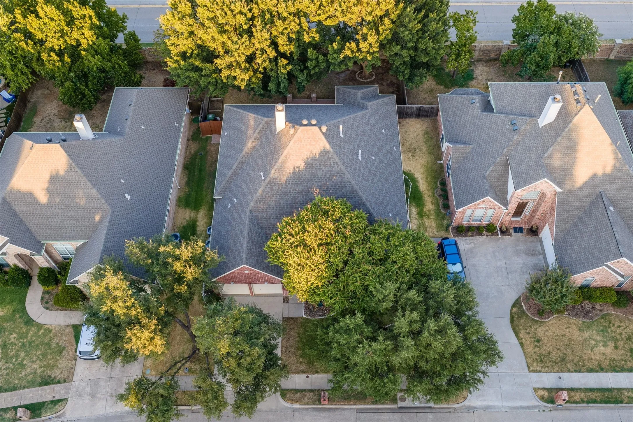 Overhead view showing the shade trees, privacy, footprint of the property, sidewalks.
