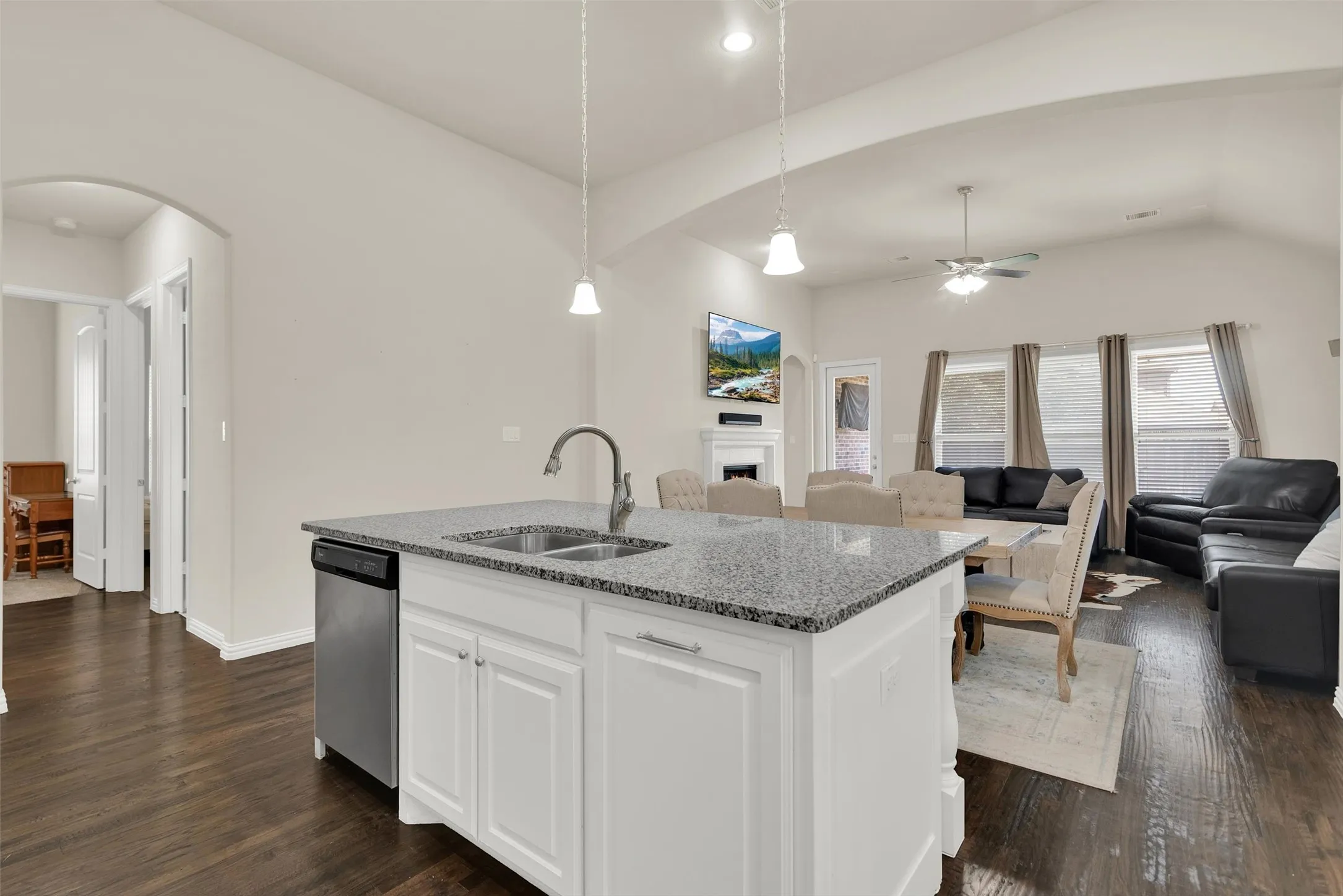 Kitchen island with granite countertop and double basin sink