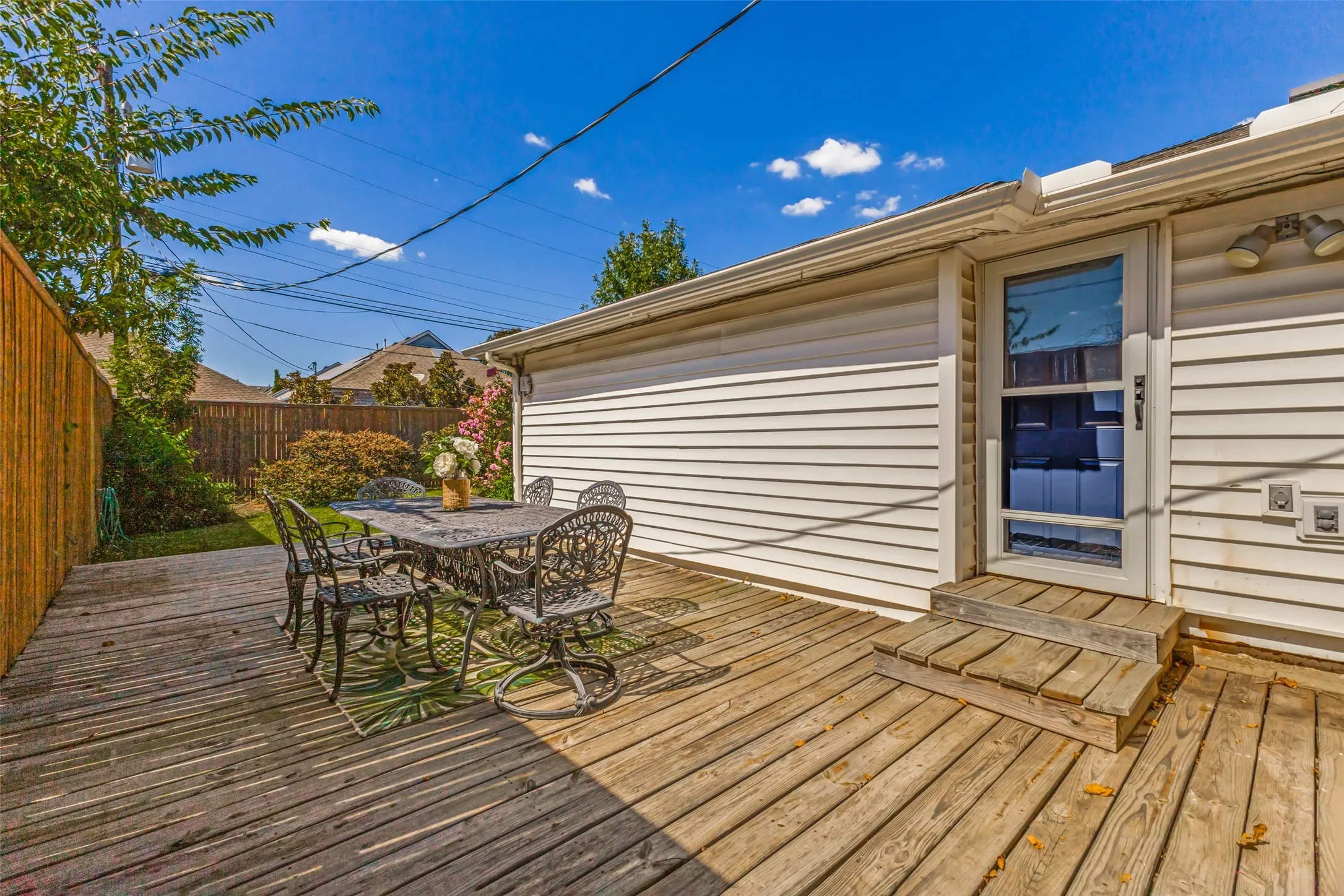 A generously sized deck is perfect for large gatherings when grilling, dining, or overseeing the kids while they play.