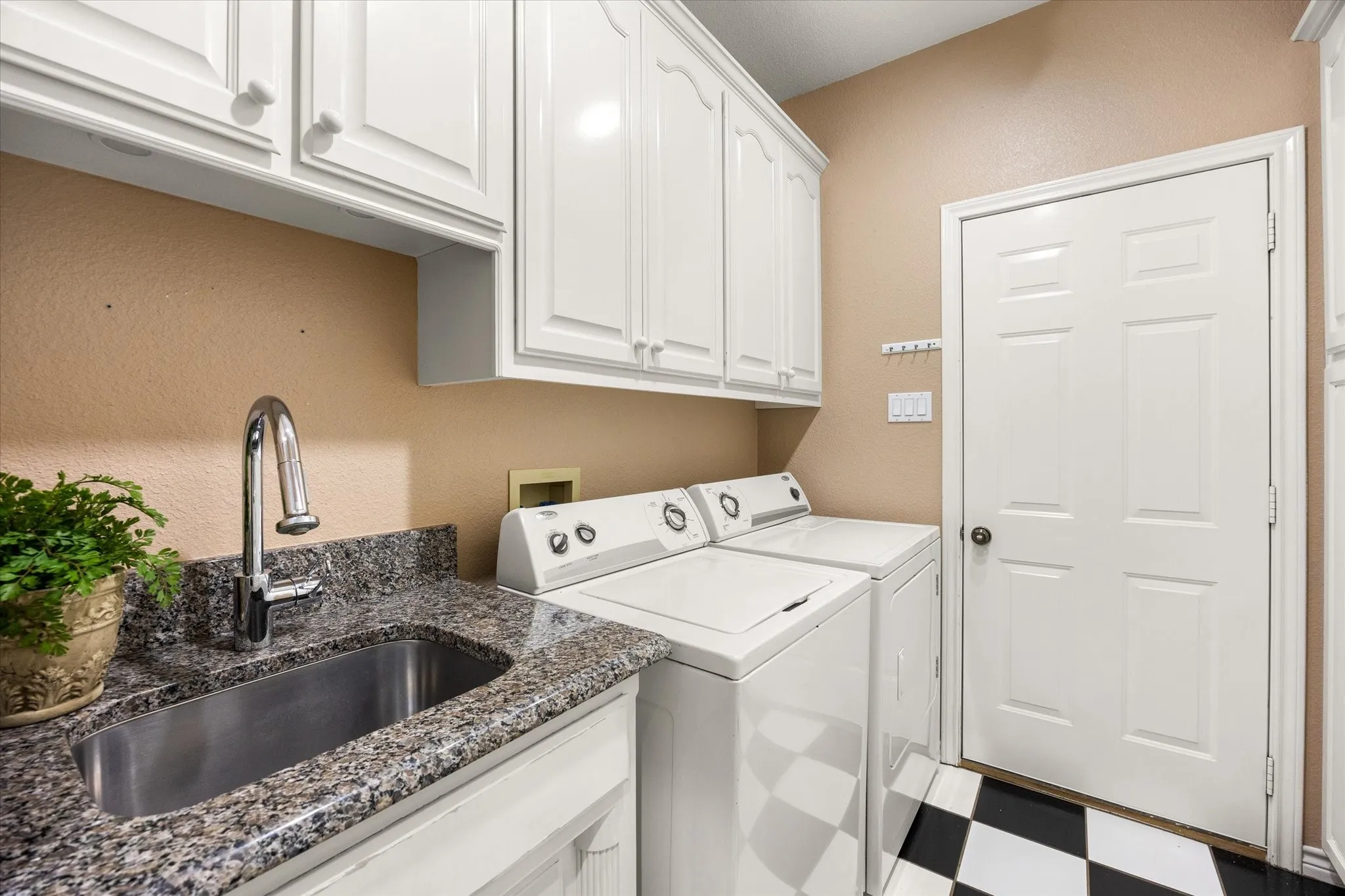 The storage in the laundry room is amazing.  A full wall of cabinets not shown-oops. Full W/D hook ups.