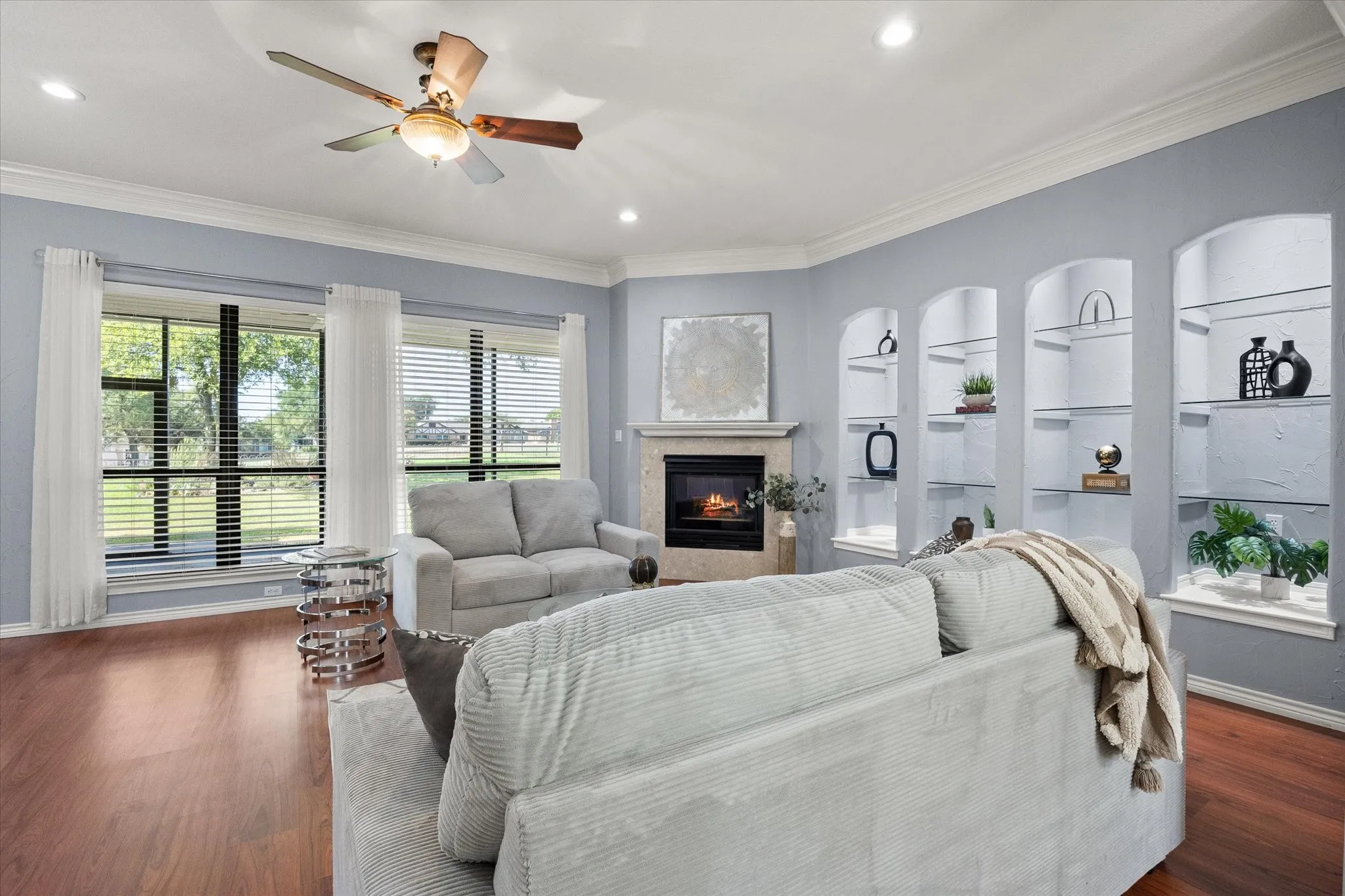 Views bring the outdoors in to this open and generous floor plan.  Floor to ceiling windows flood light into all of the living areas.