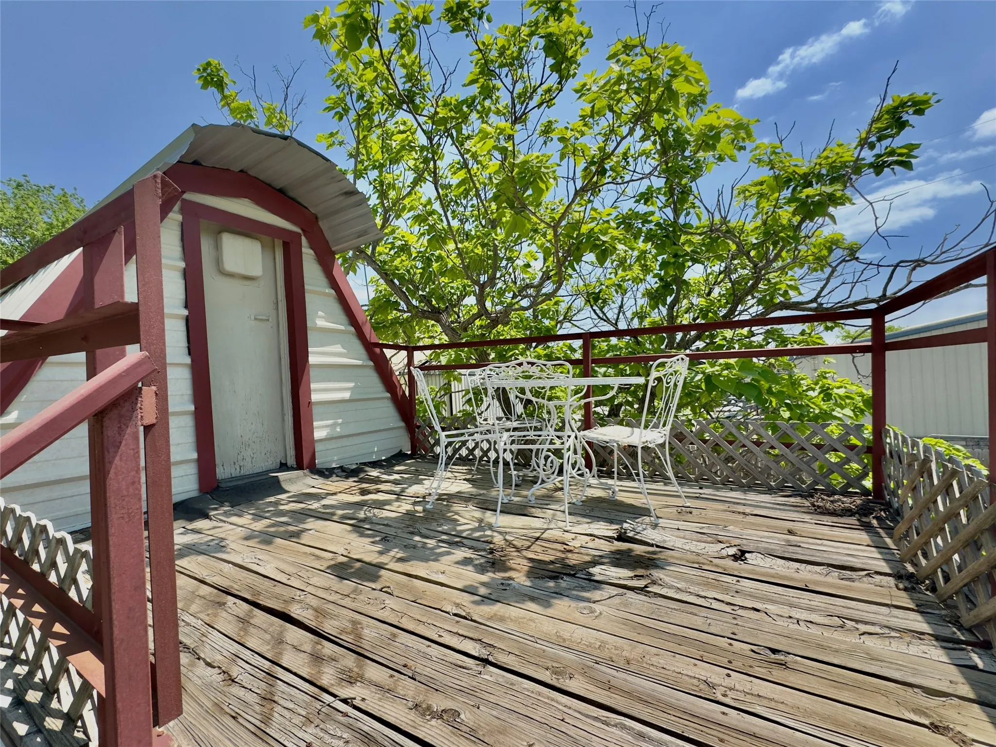 Wooden deck with outdoor dining area