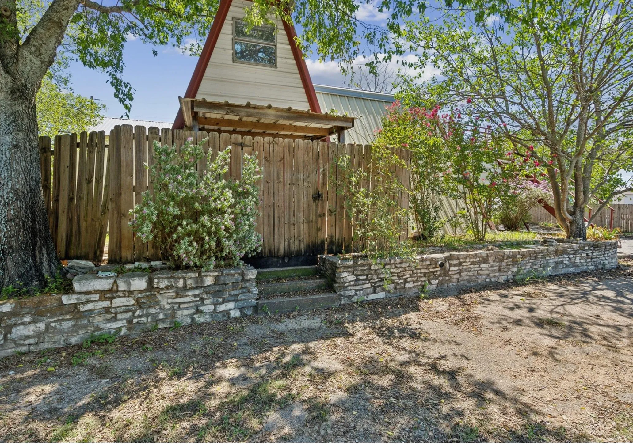 View of yard featuring fence