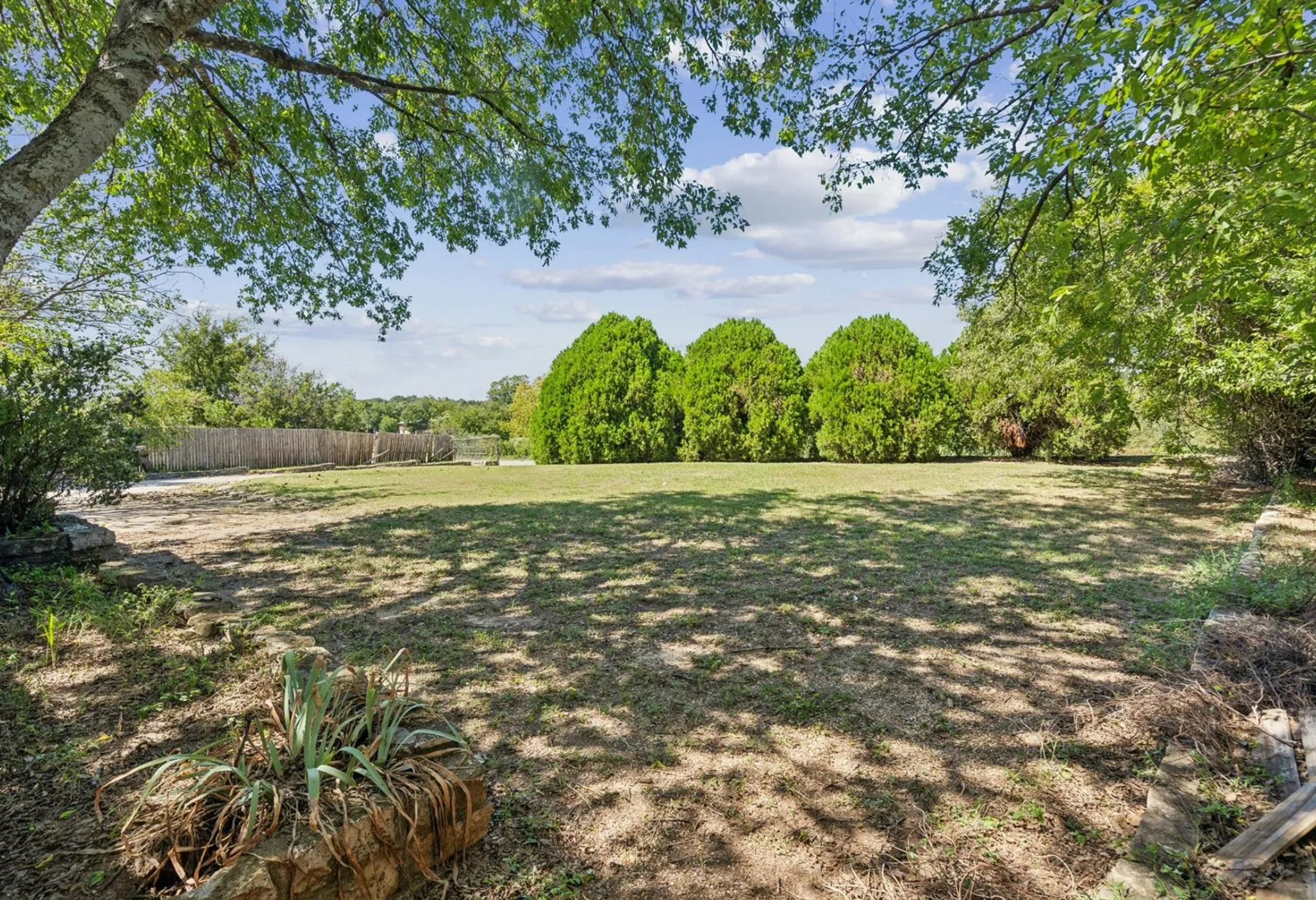 View of yard with fence