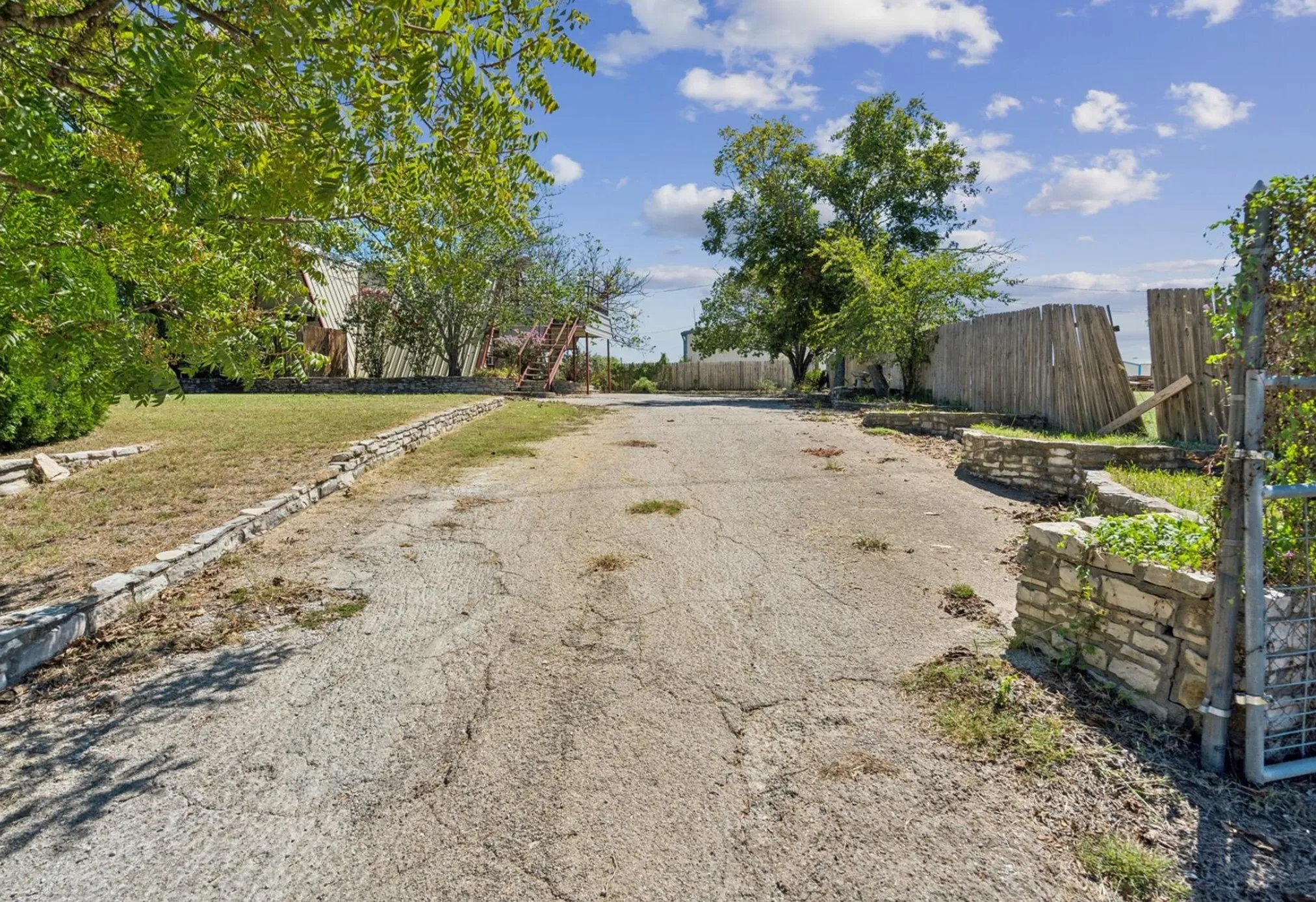 View of street featuring driveway