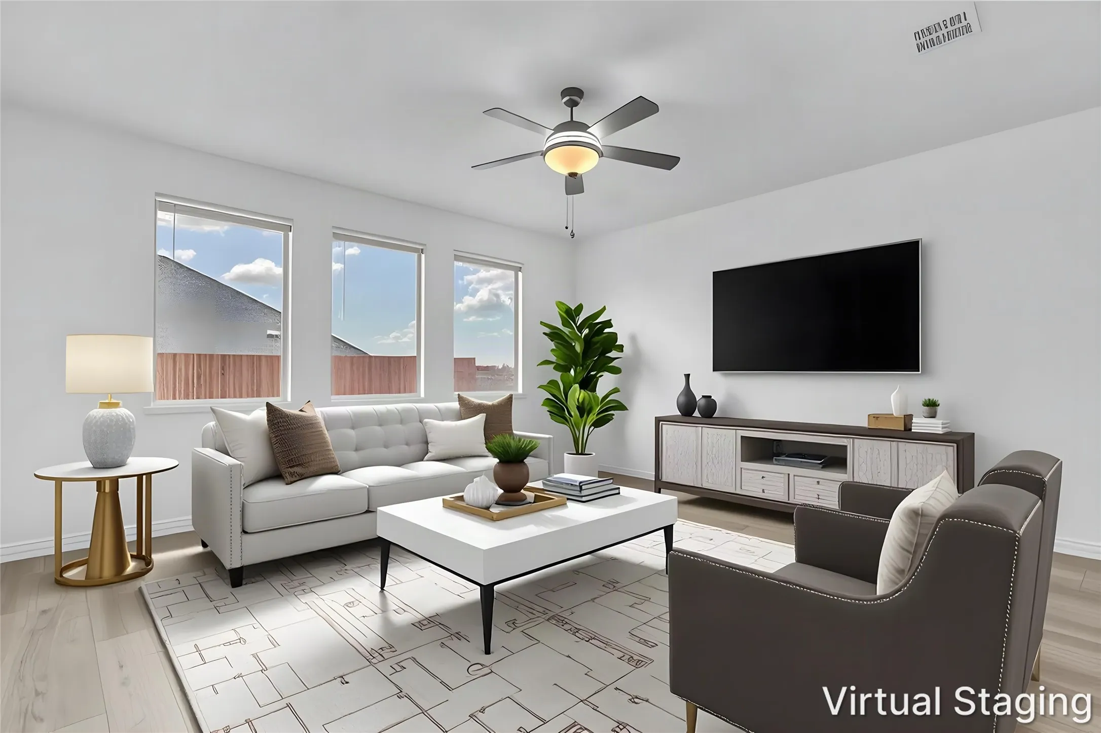 Virtually staged living room with three windows and a ceiling fan, showing a sample furniture layout