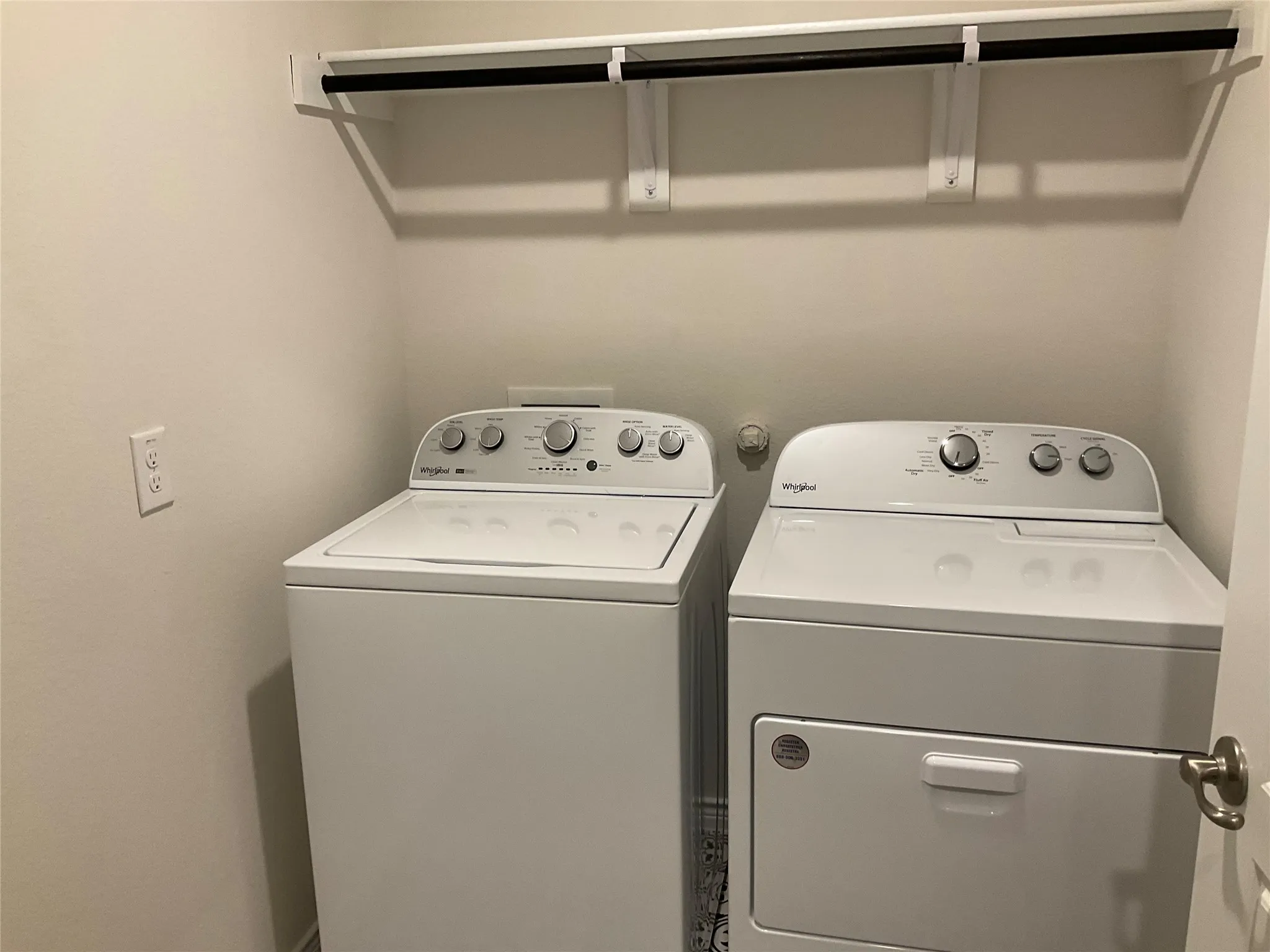 Laundry area with laundry area and washer and clothes dryer