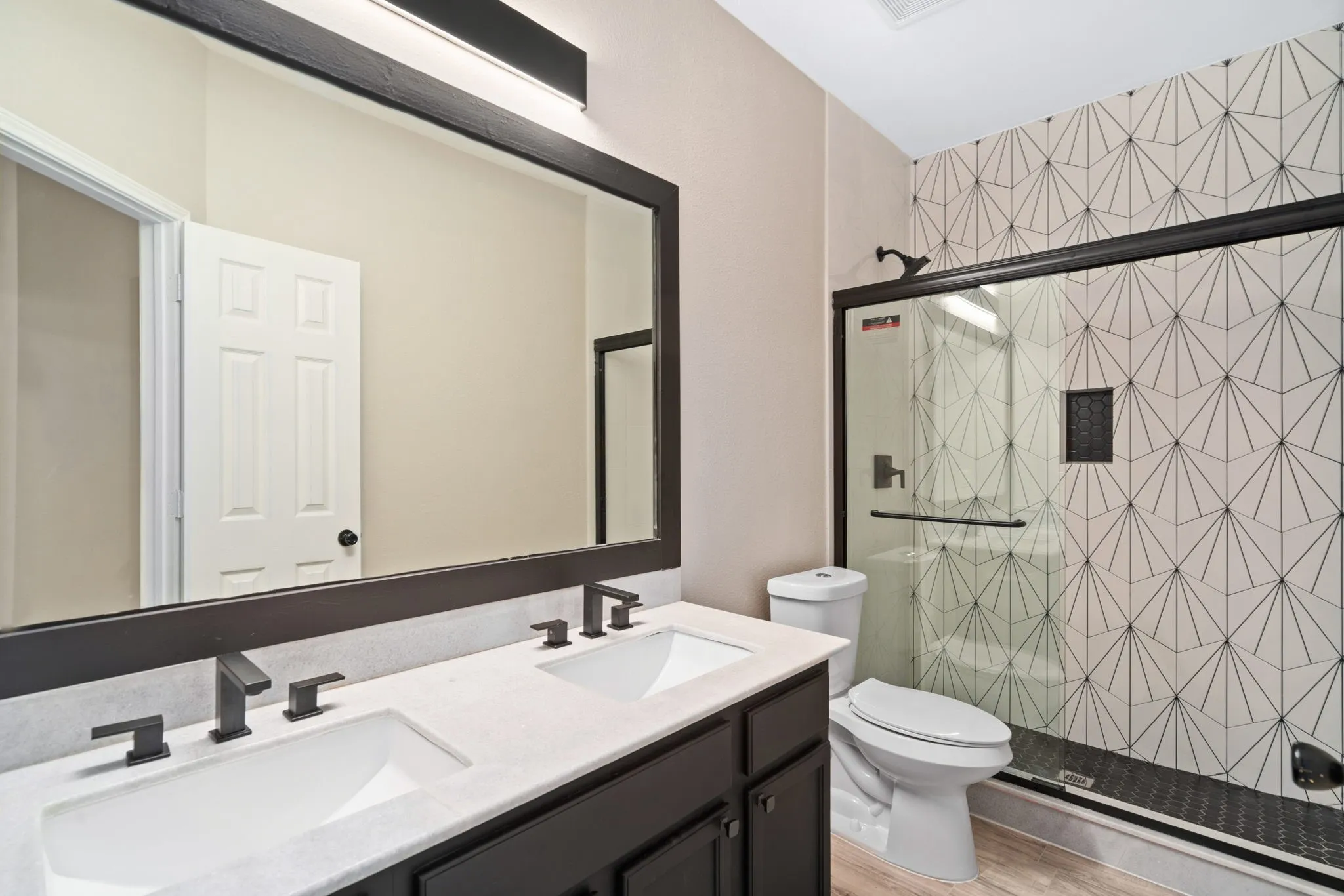 The secondary bath is well appointed.