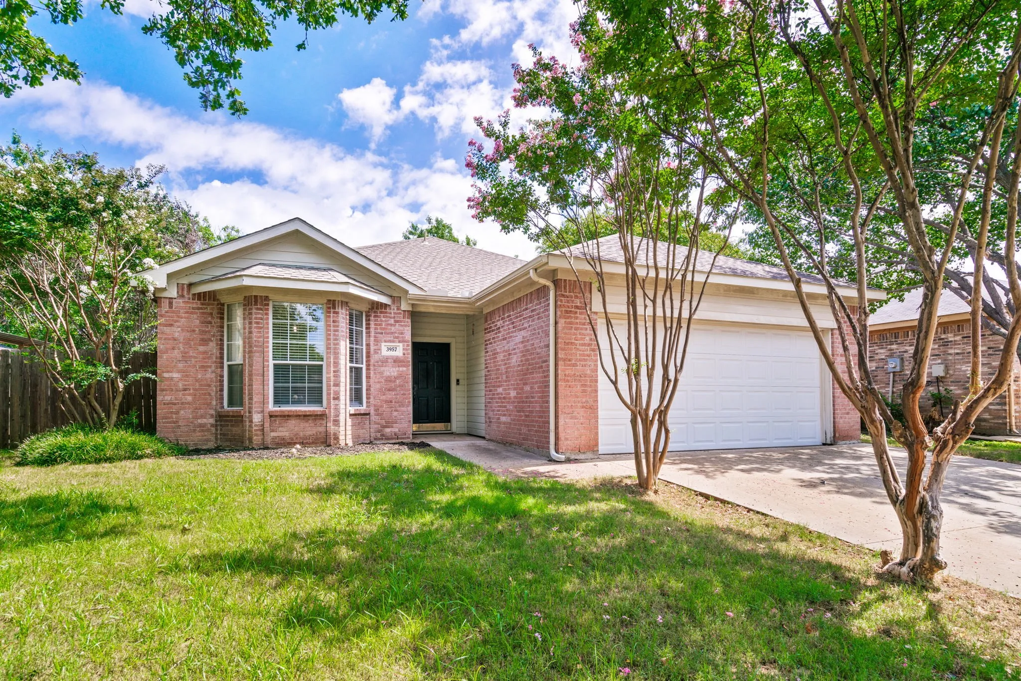 3957 Parkhaven Drive is a charming one story home located in Denton's Hickory Creek Heights community.