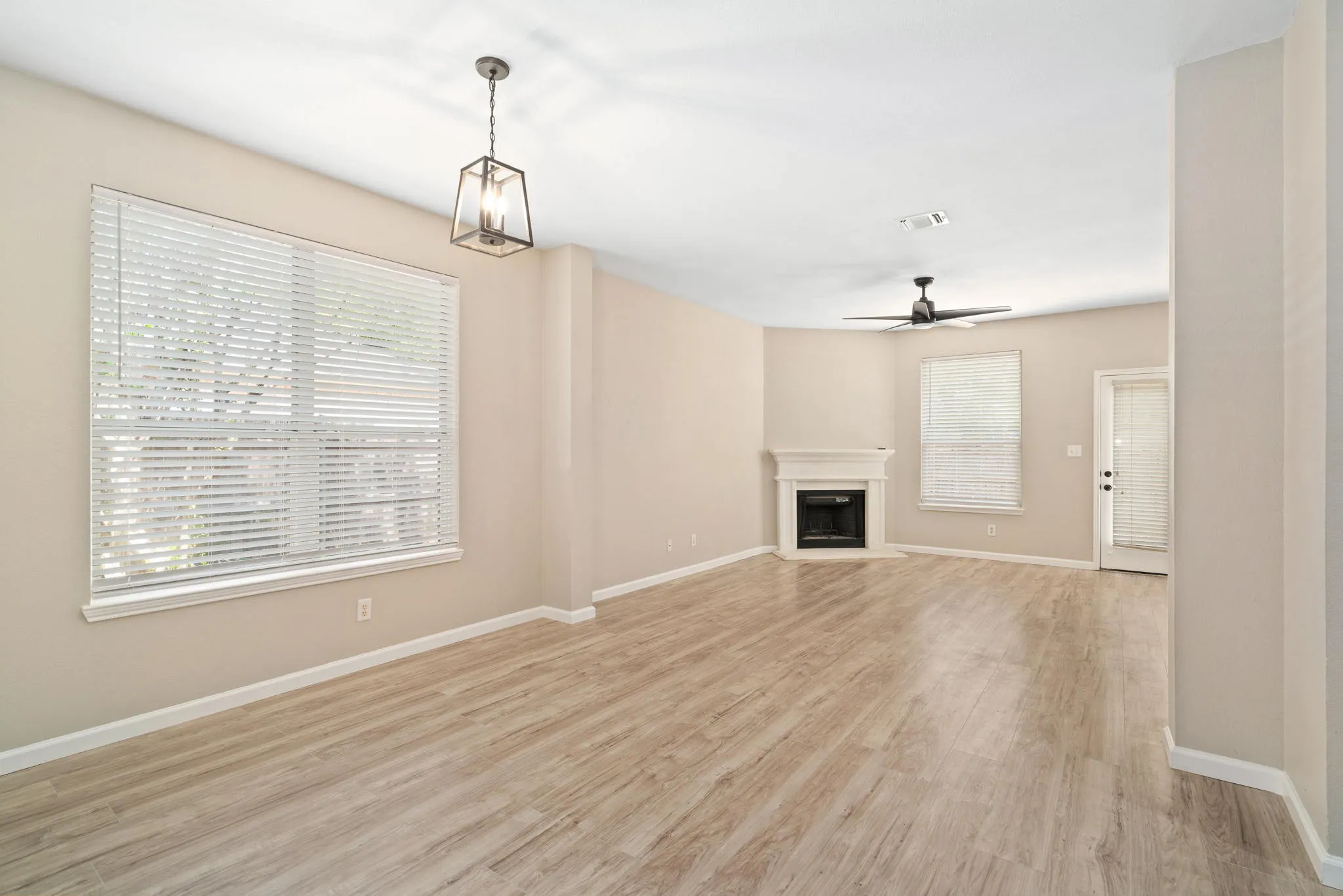The gorgeous open floor plan sets a welcoming tone for entertaining or family fun.