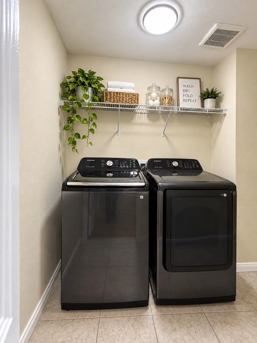 Tile flooring, overhead lighting, and built-in shelving