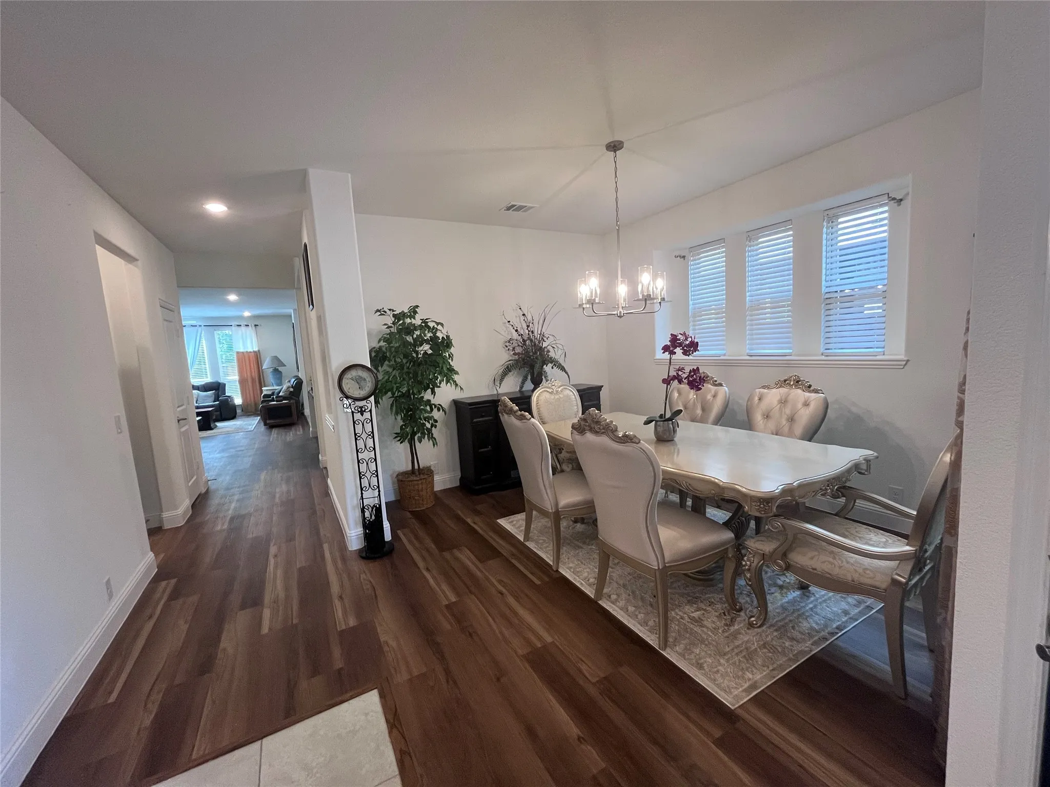Wood-finish plank flooring throughout