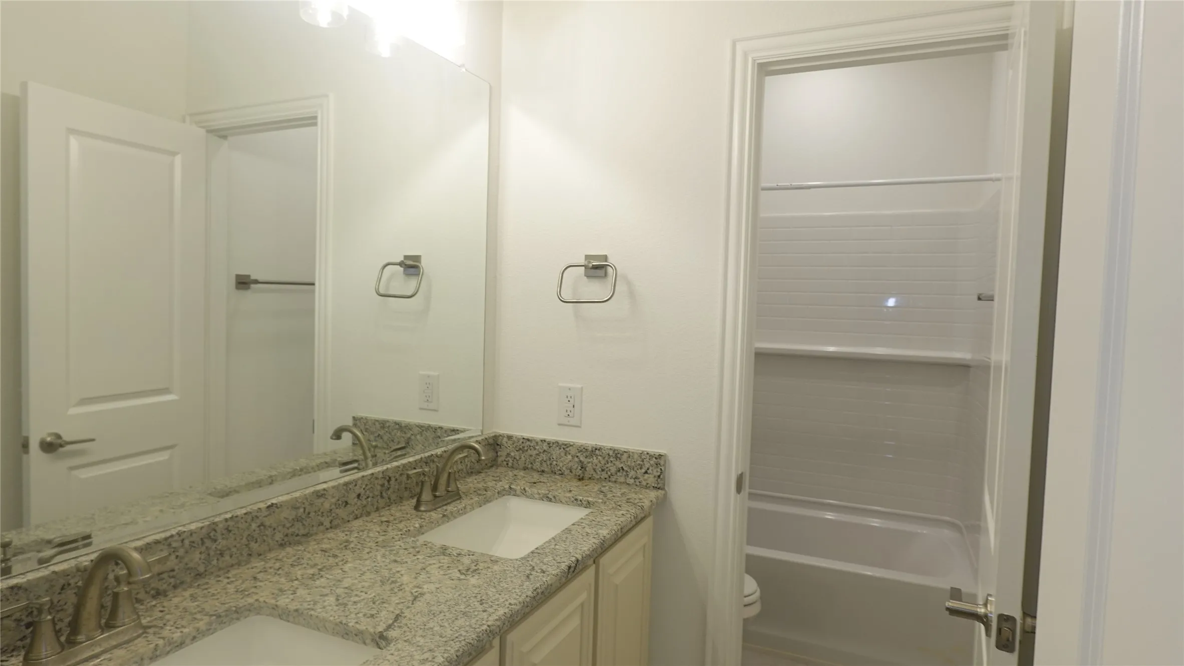 Dual vanity with stone countertop