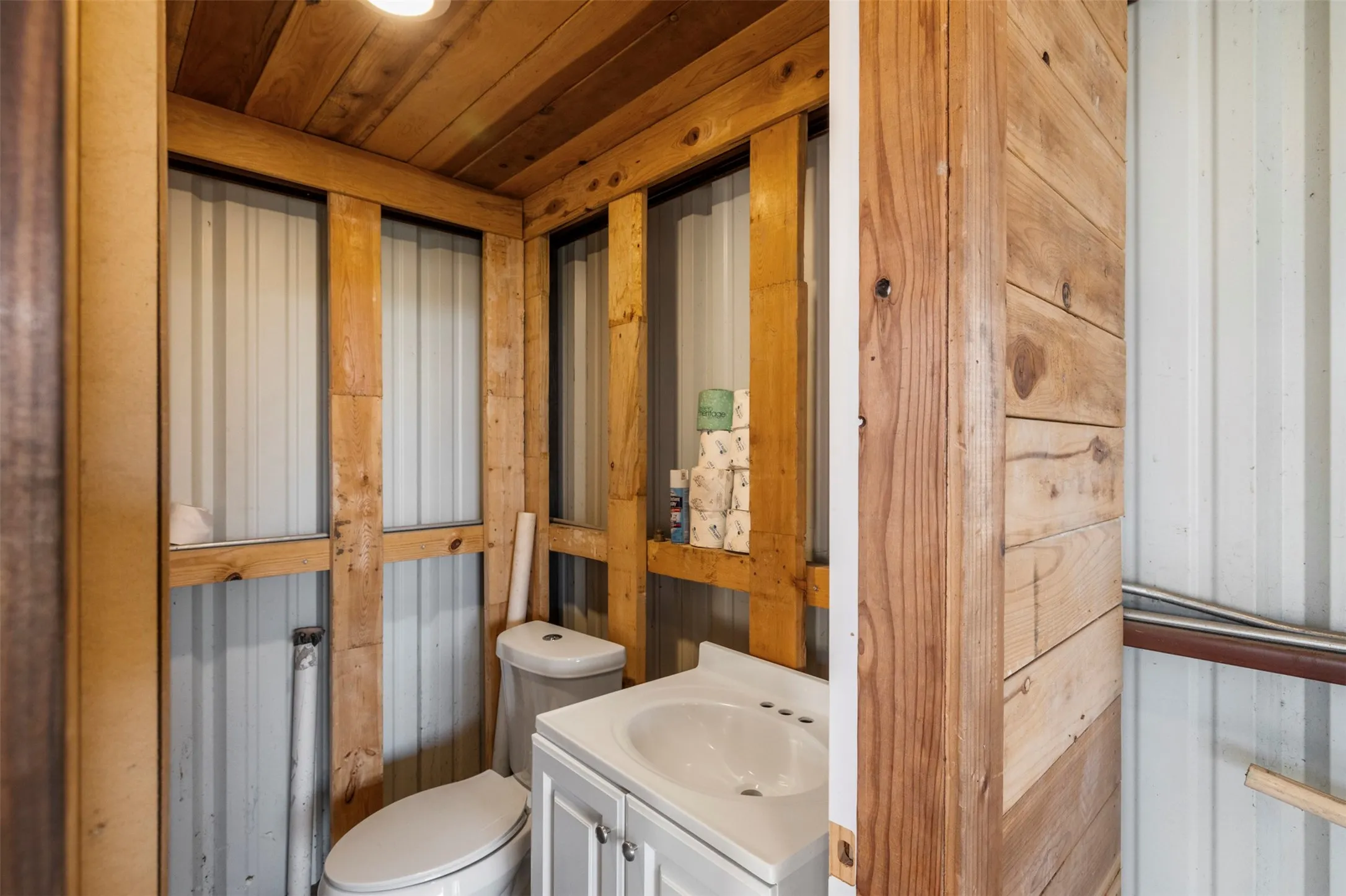 Wood-paneled walls and ceiling