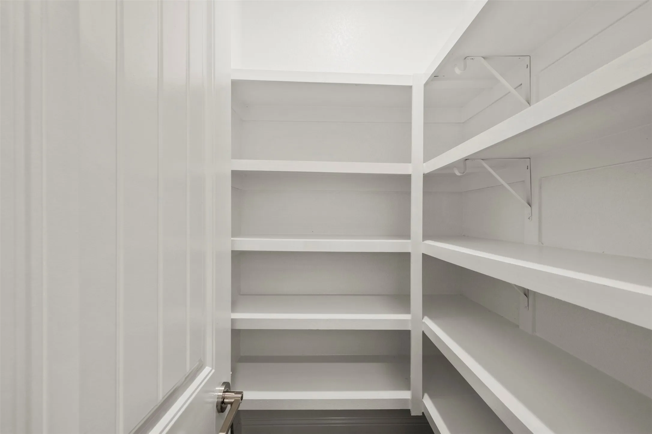 Built-in shelving with white finish
