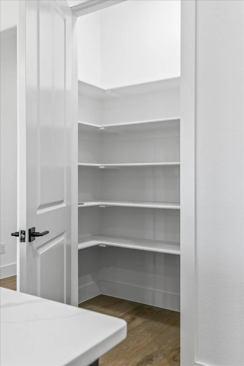 Generous walk in pantry with motion sensor lighting