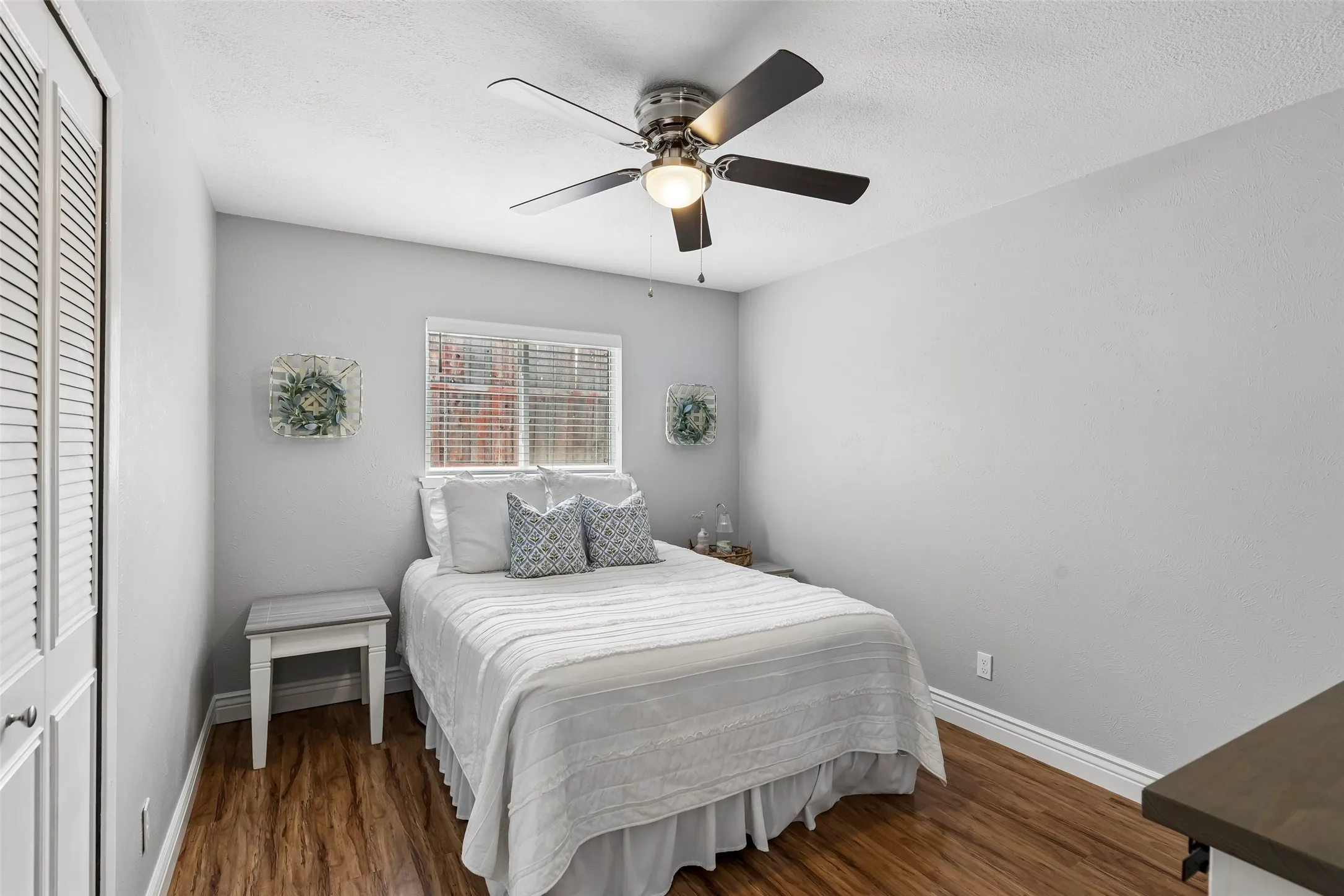 Natural light gives this secondary bedroom an easy, ready-to-move-in feel.