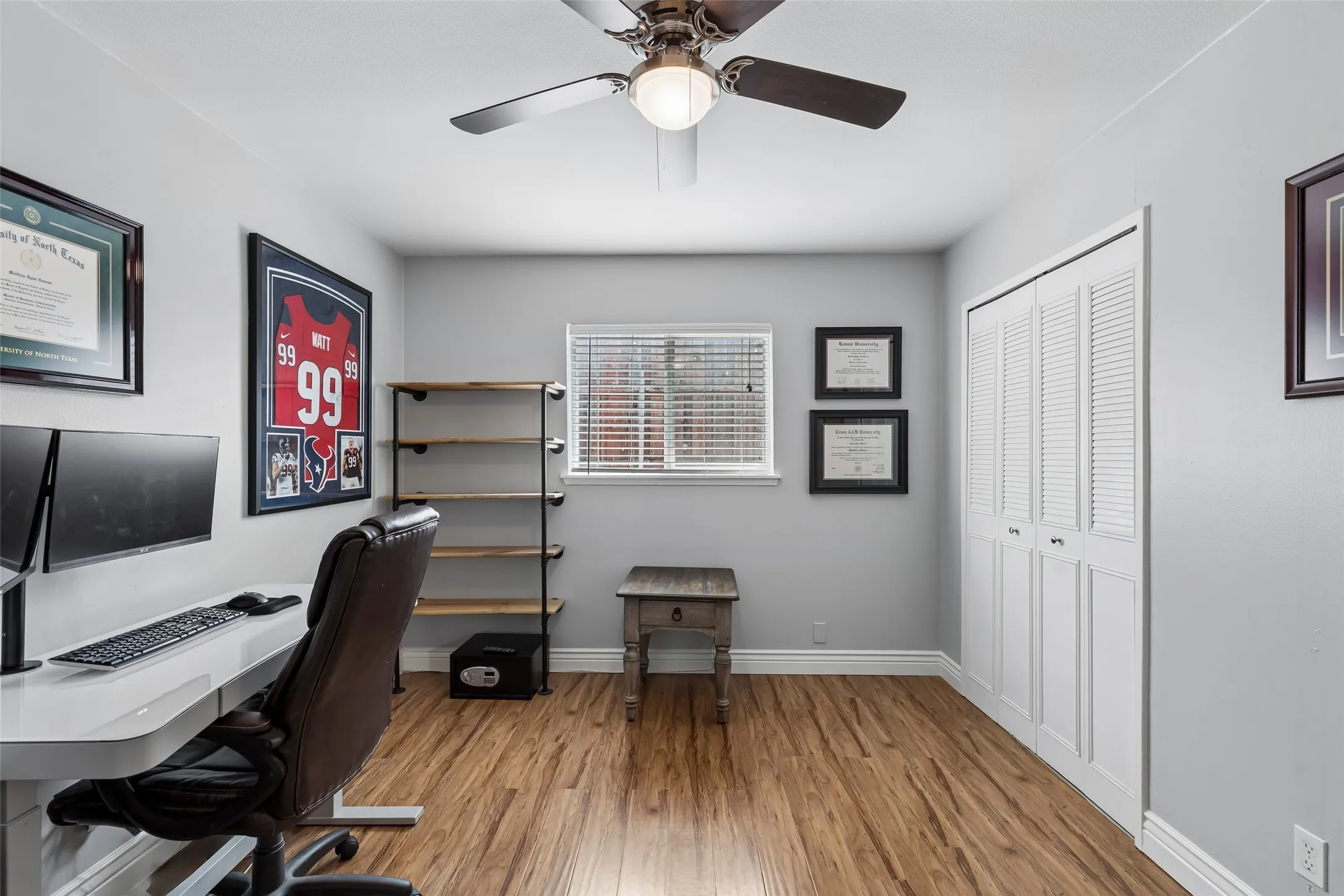 A full window keeps the home office bright without losing wall space.