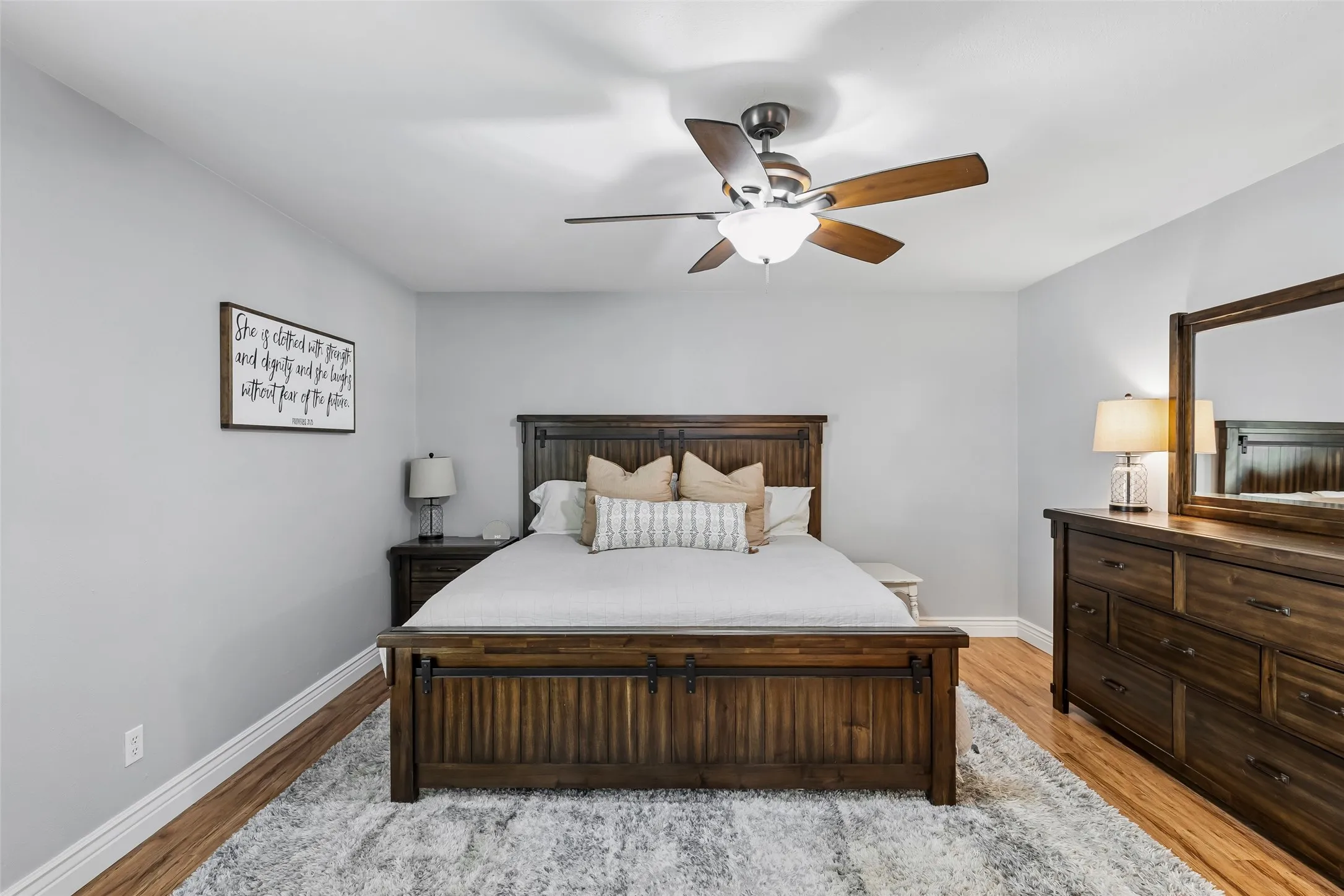 Big enough for a king bed and a full dresser wall, with a private bath just through the door.