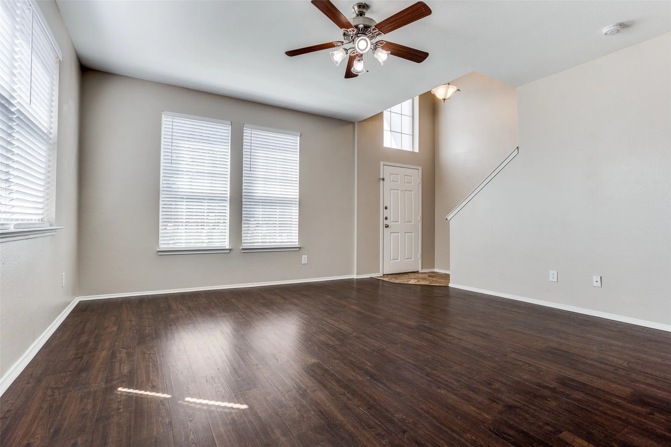 Large living area downstairs facing entry.