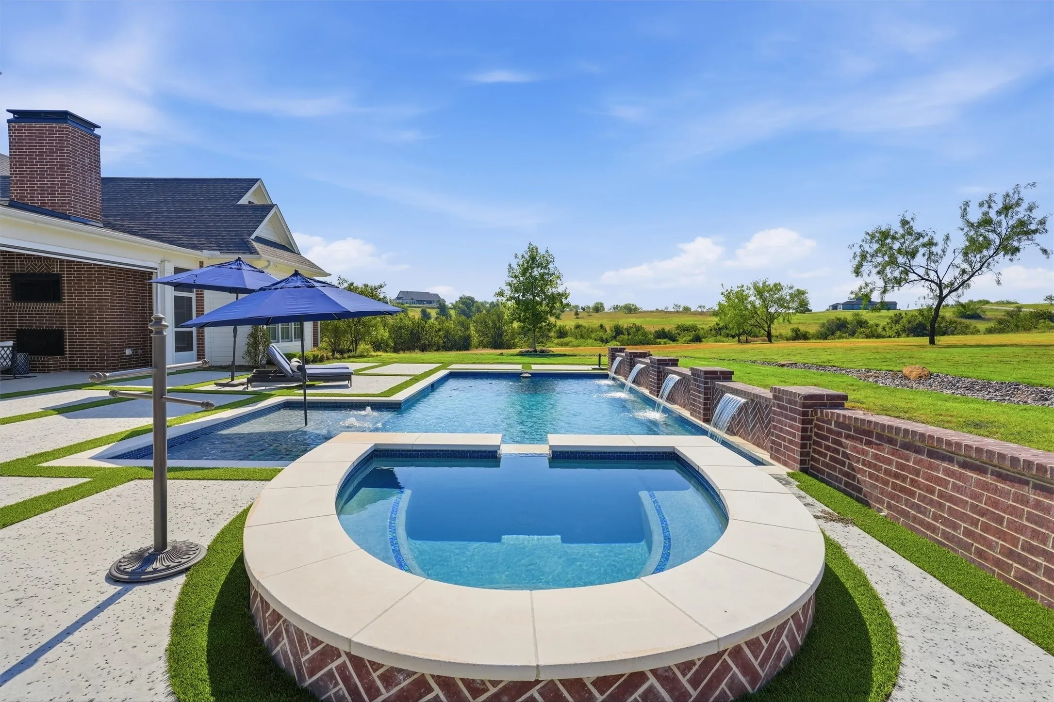 The spa is perfect for relaxing while dinner is being prepared in the outdoor kitchen.