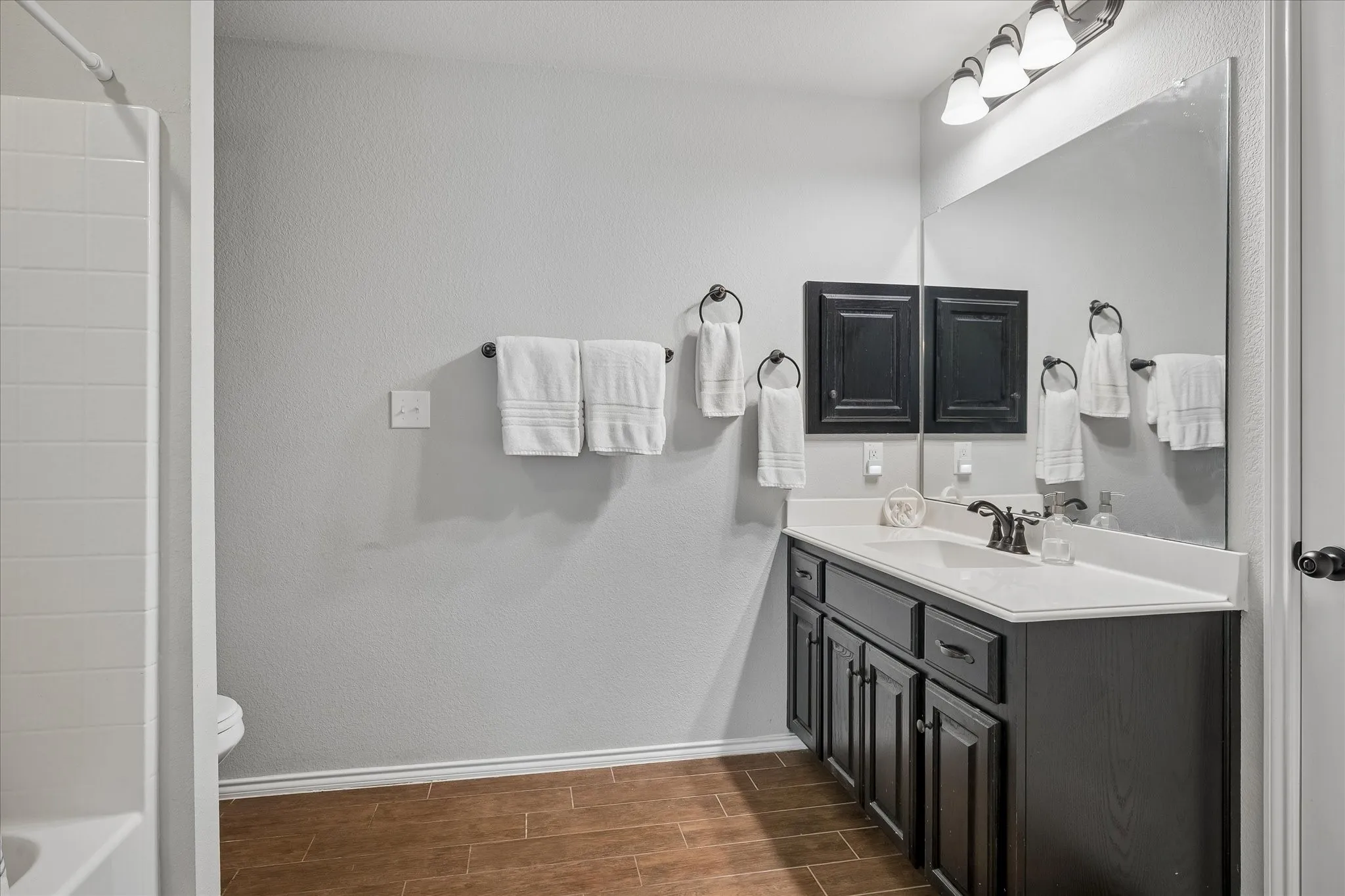 Attached to Bedroom 4 and has hallway access