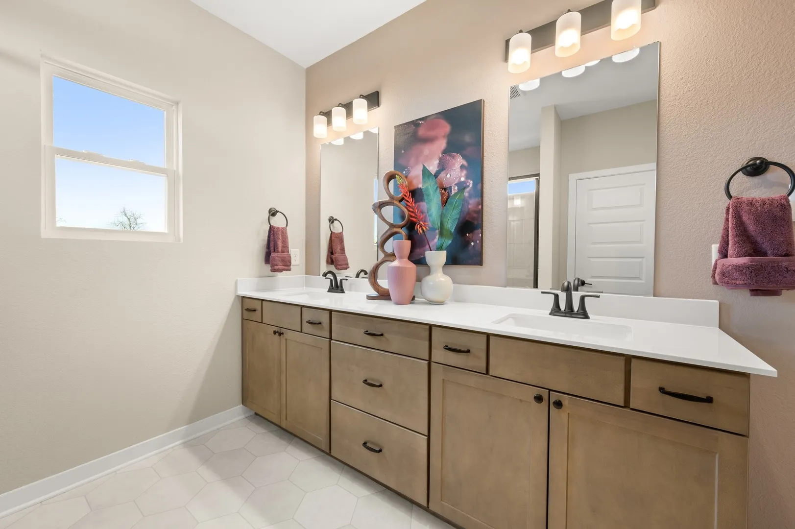 The Oakshire II- Primary Bathroom with Dual Vanities and Walk-In Shower