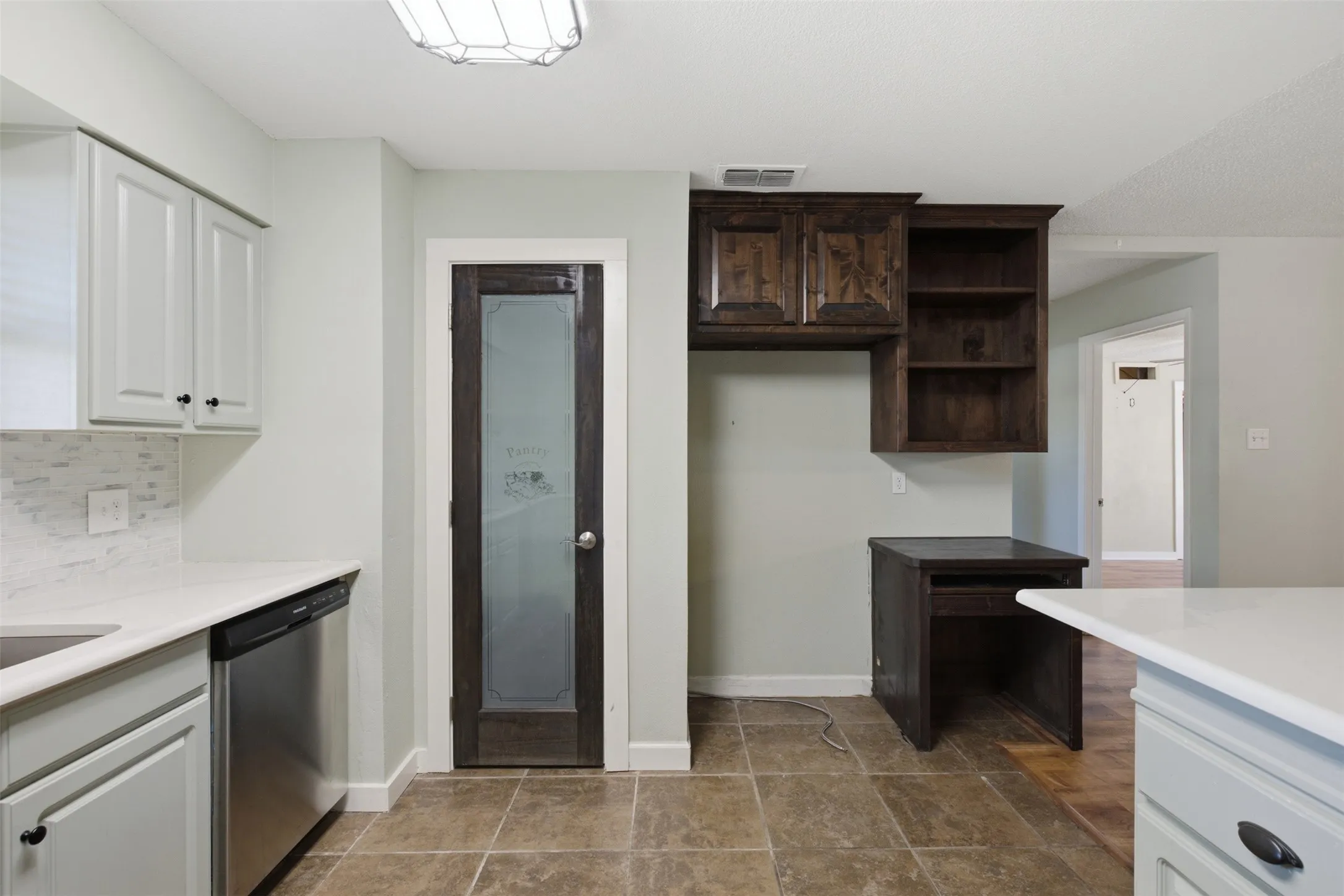 Pantry and desk in kitchen