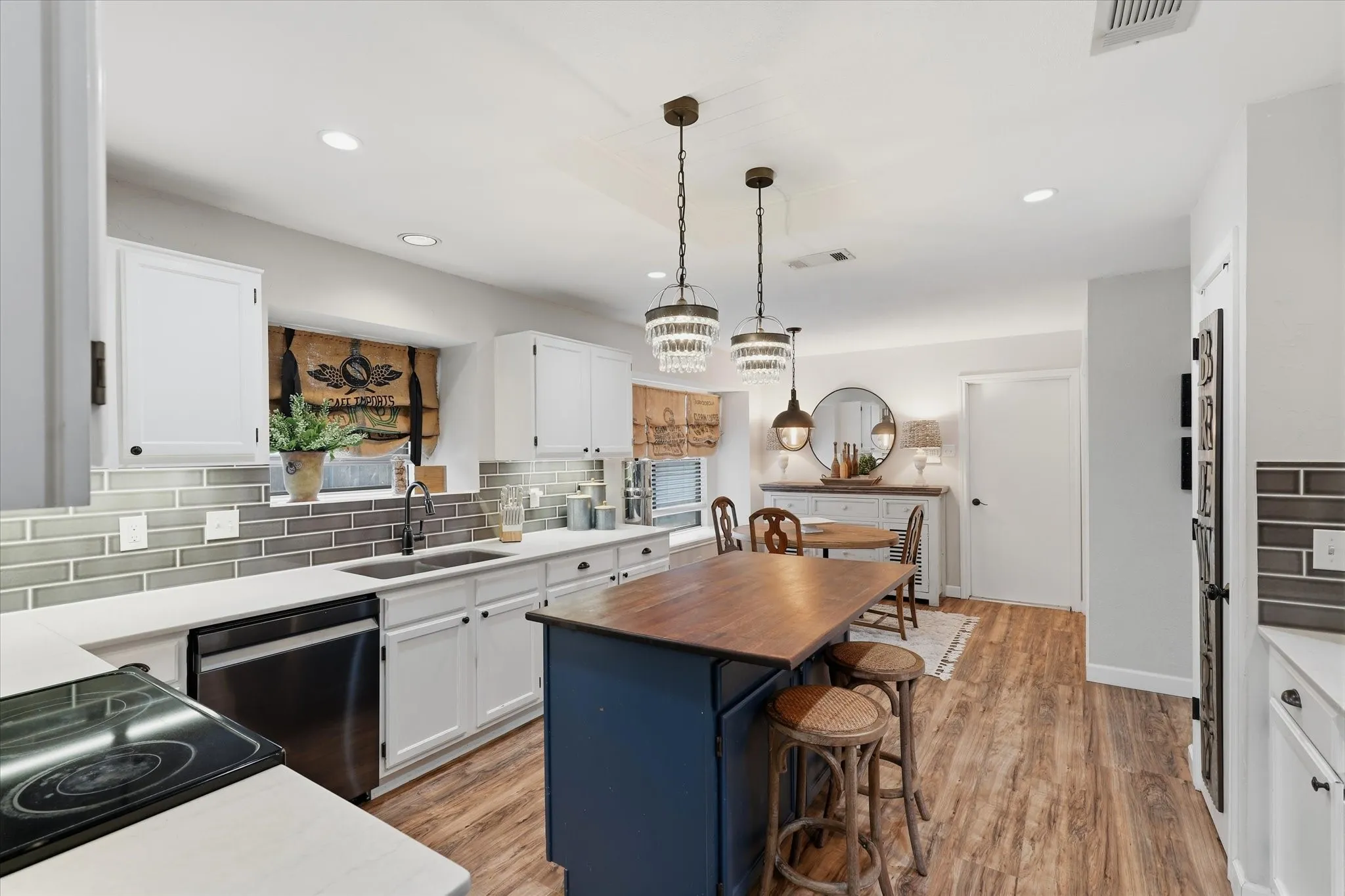 Spacious kitchen opens to the dining area for an easy everyday flow, while the center island provides additional prep space and seating.