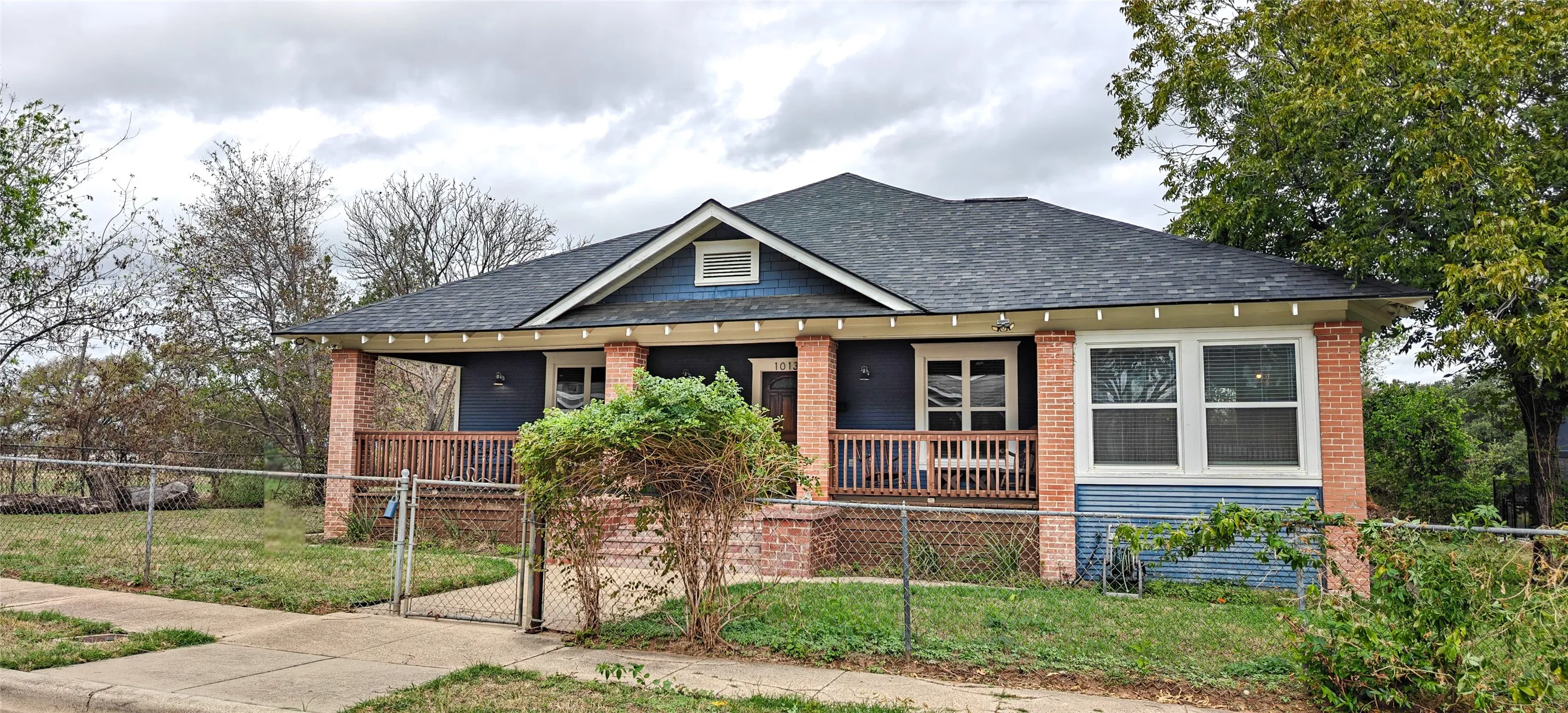 1924 Craftsman on a lot platted in 1911, when Poindexter was still Pearl Street.