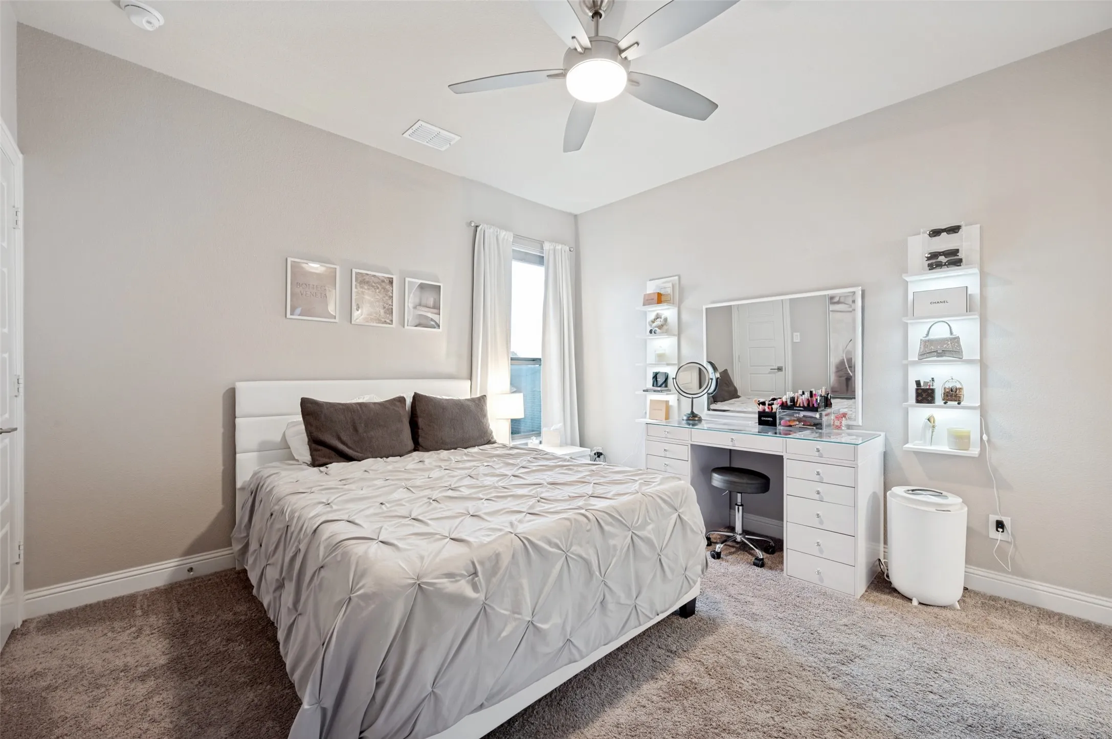 Light-colored walls with carpet flooring