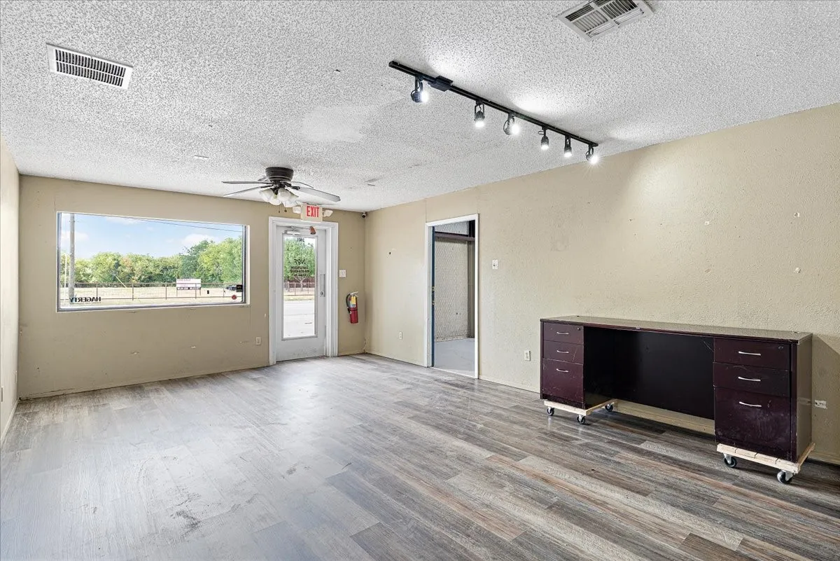 Wood-finish flooring, recessed lighting, and a ceiling fan