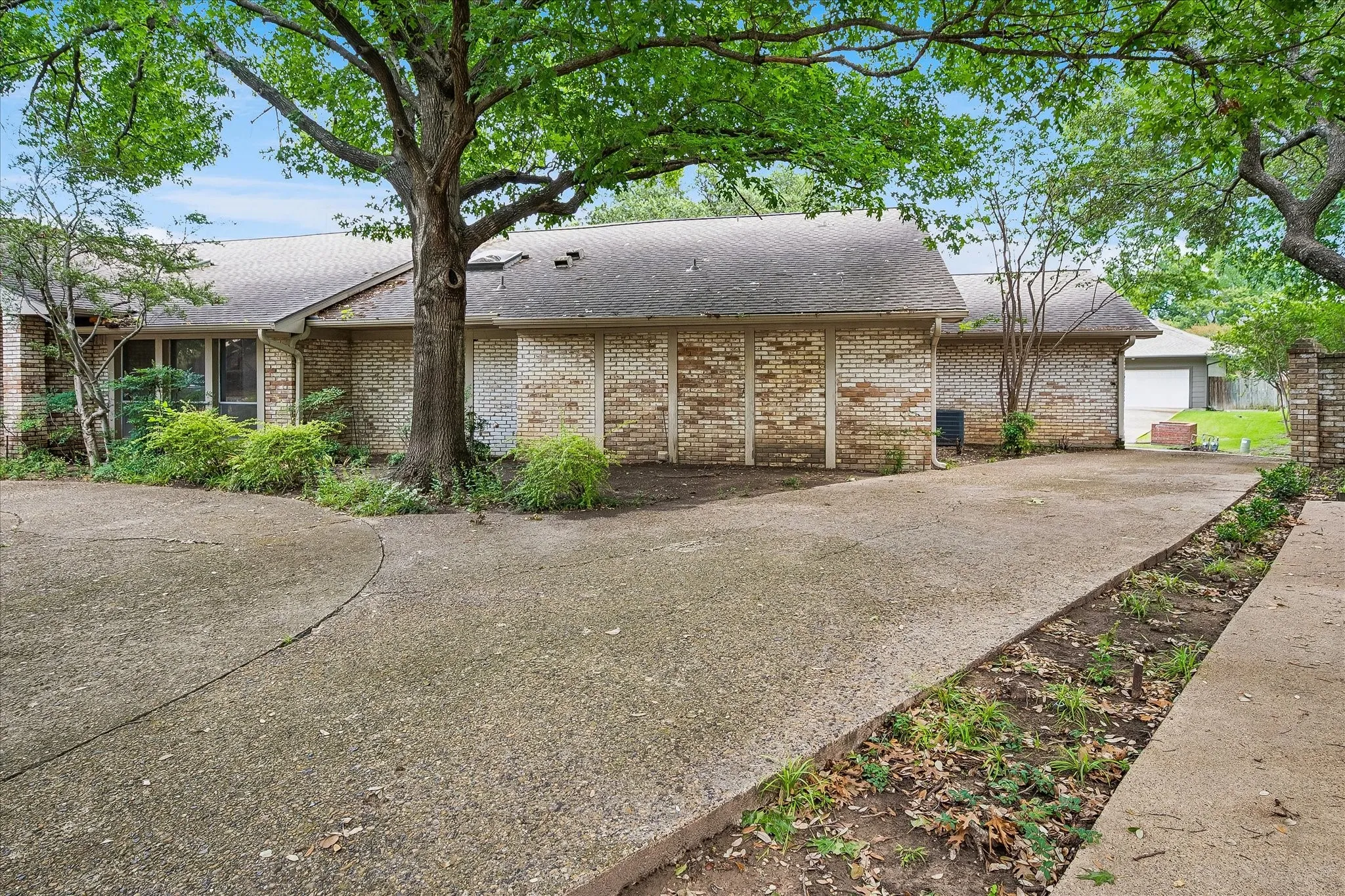 Driveway leading to the garages