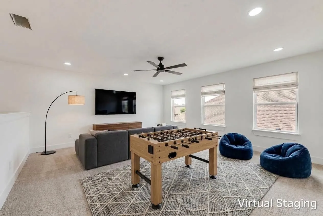 Recessed lighting, ceiling fan, three windows with blinds, and white walls