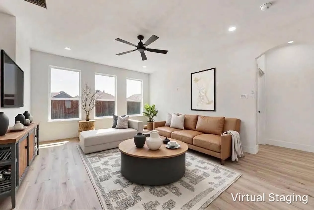 Spacious room featuring light wood-finish flooring, recessed lighting, and a ceiling fan