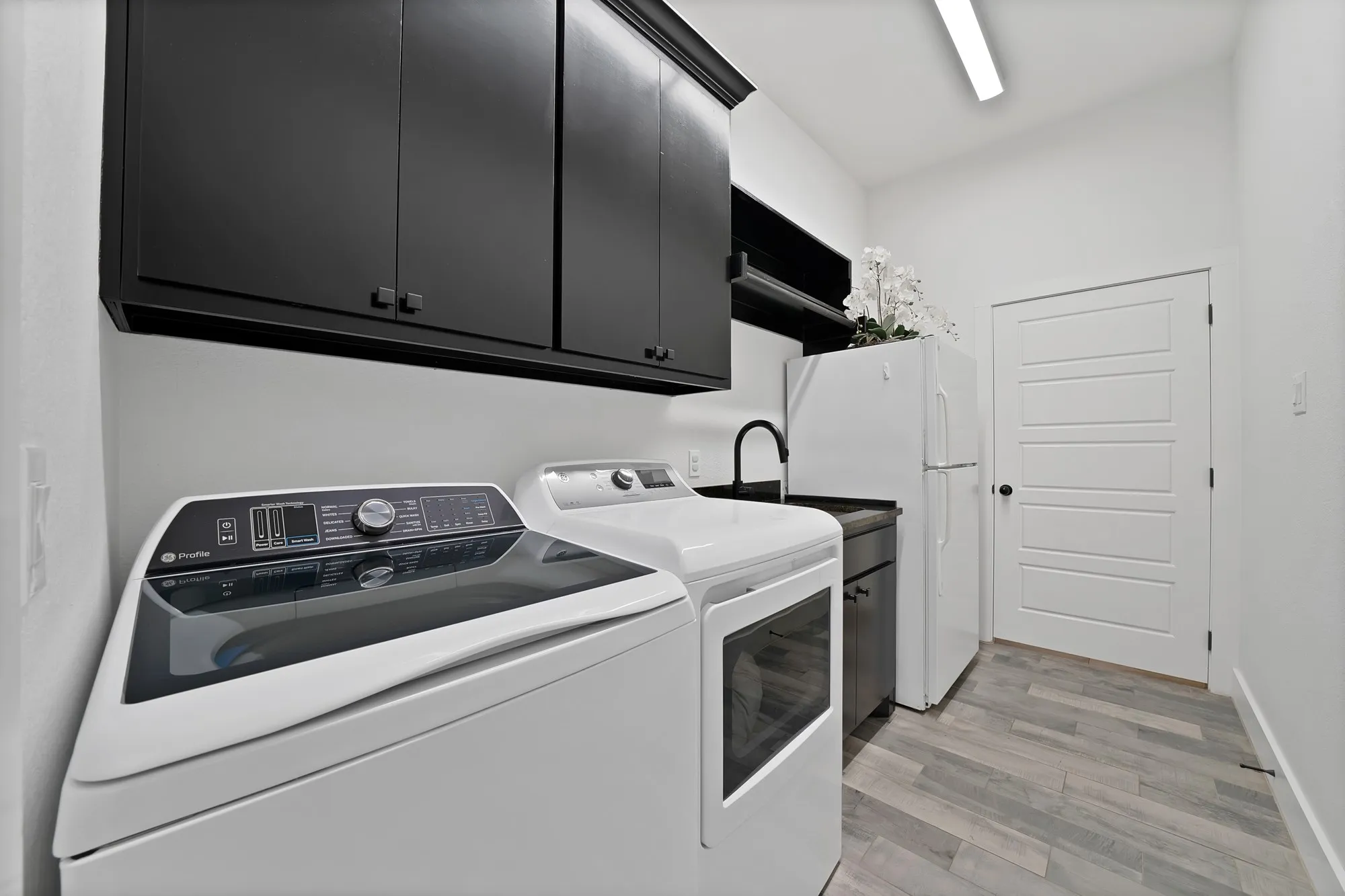 Complete with cabinetry, sink and space for a fridge