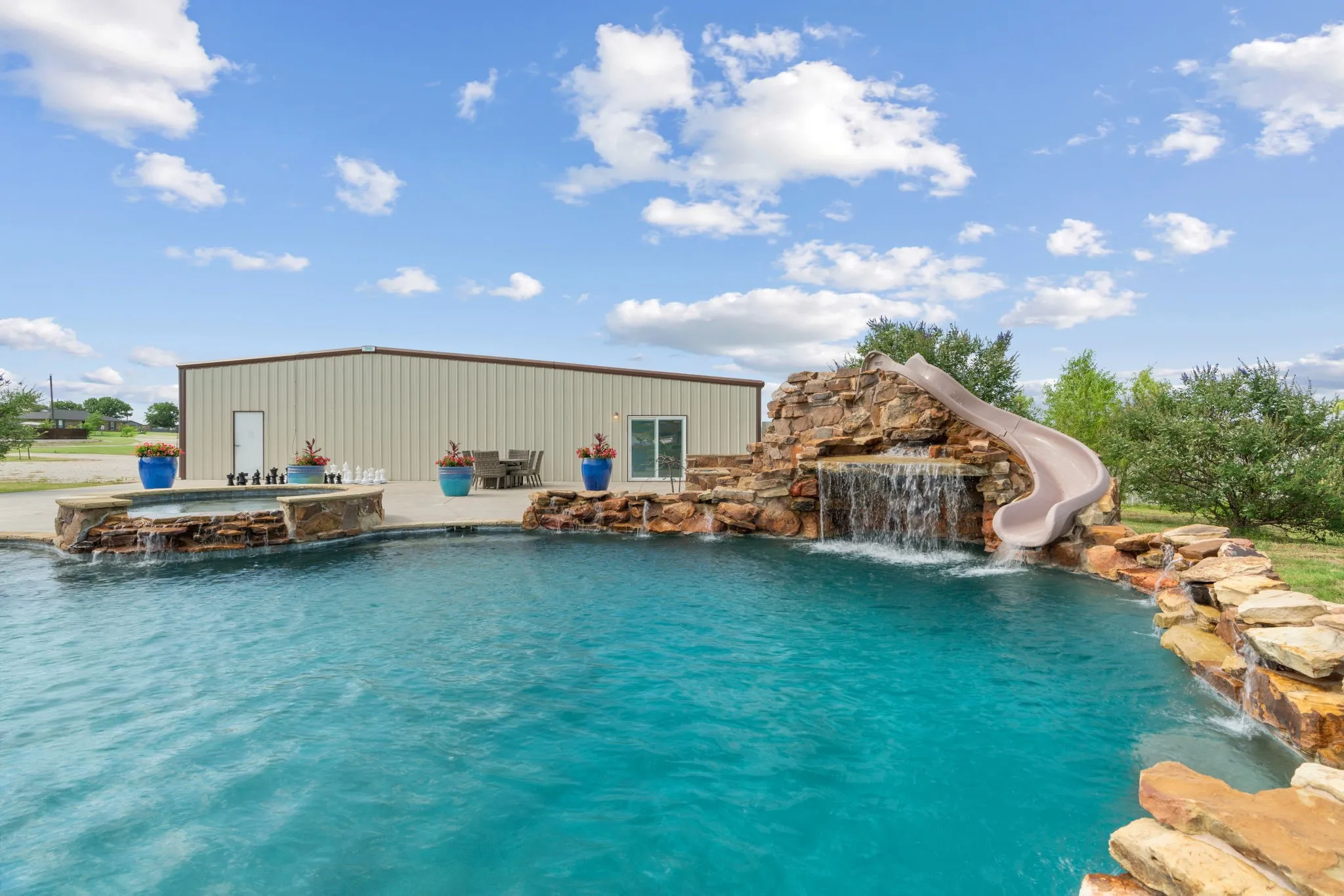 Pool with slide and spa!