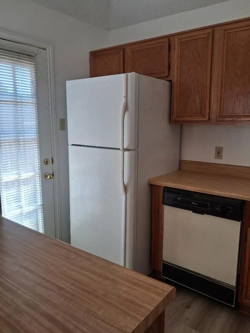 REFRIGERATOR REMAINS WITH THE PROPERTY