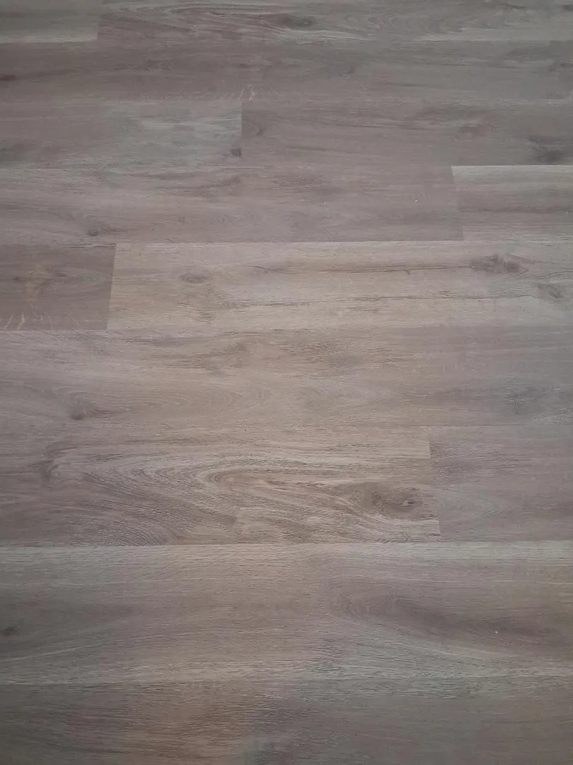 NEW LUXURY WOOD PLANK VINYL THROUGHOUT THE ENTIRE HOME