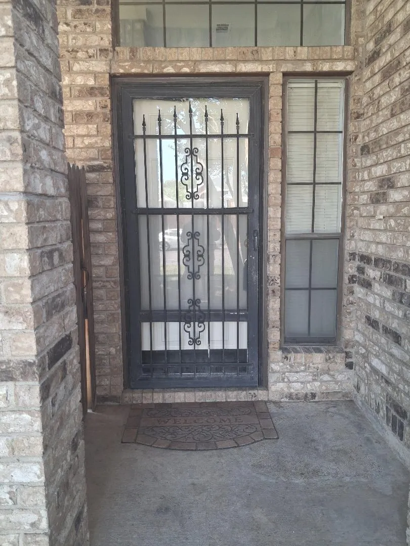OPEN THE DOOR TO THIS DELIGHTFUL GARDEN HOME